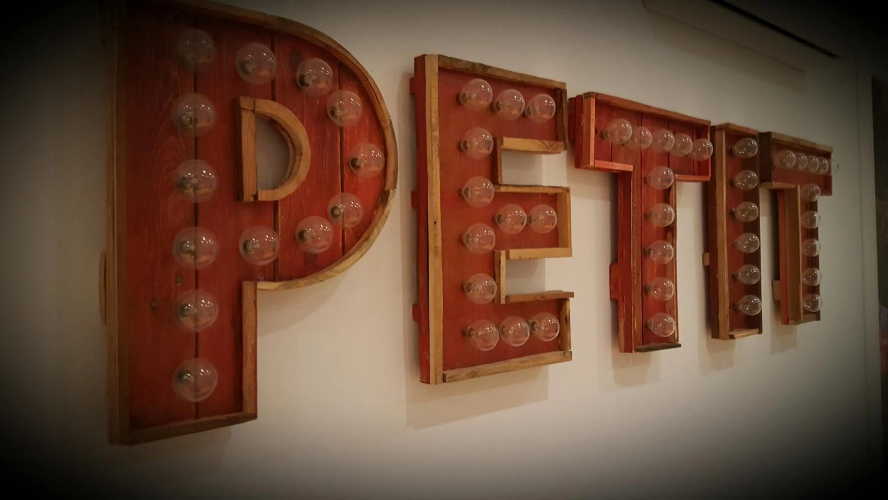 Property logo or sign in Petit Hotel