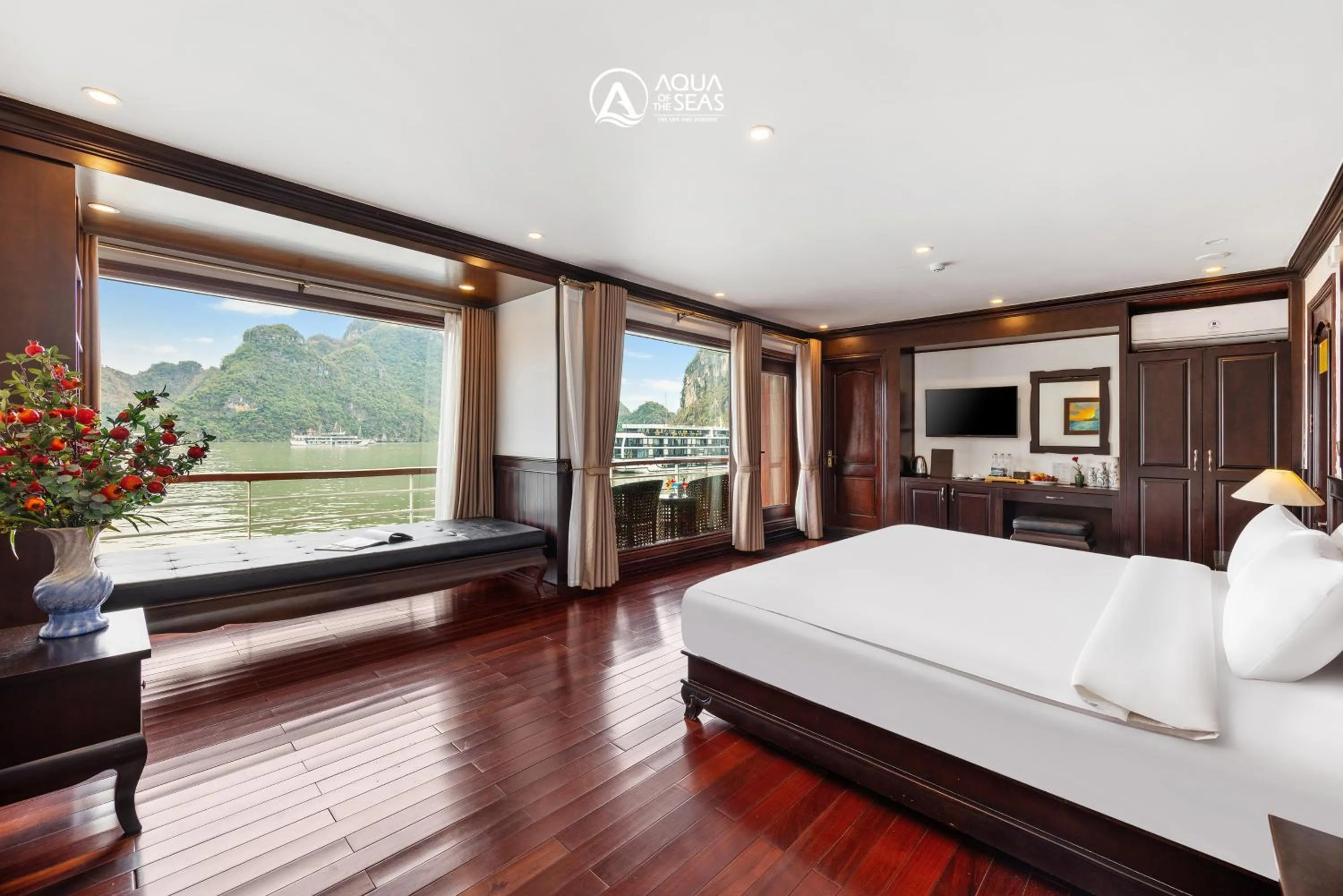 Living room, Bed in Aqua Of The Seas Cruise Halong by AHG