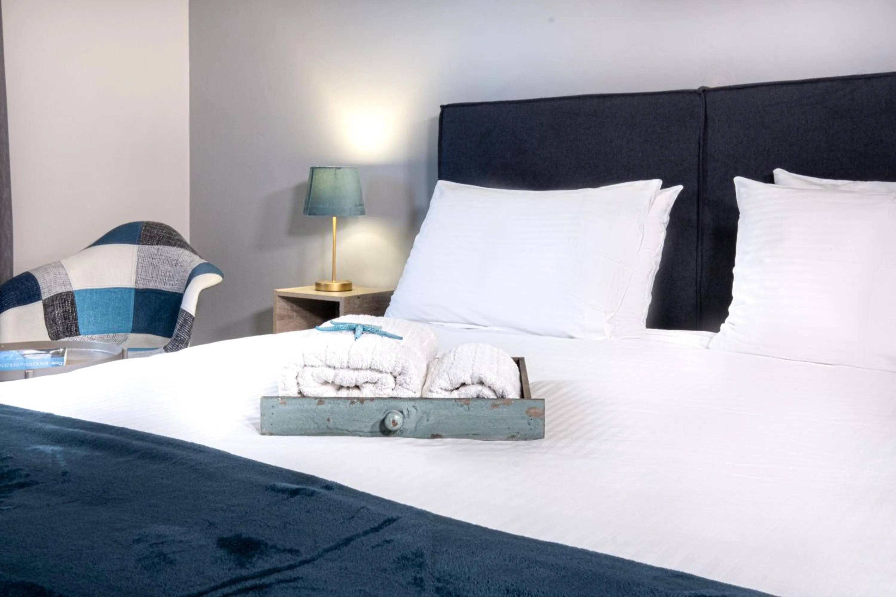 Bed in RIVIERA HOTEL