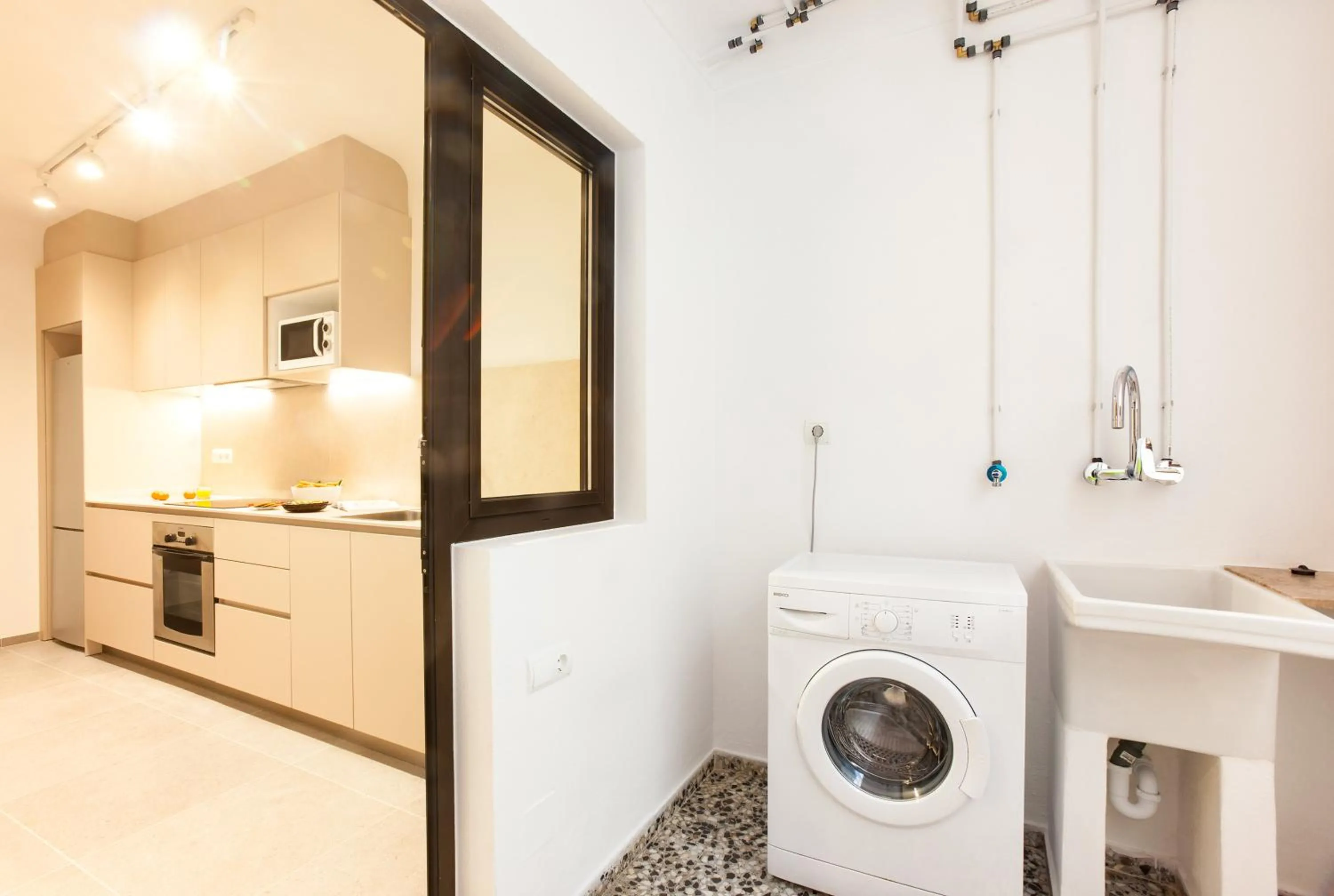 washing machine in Apartamentos Bahia