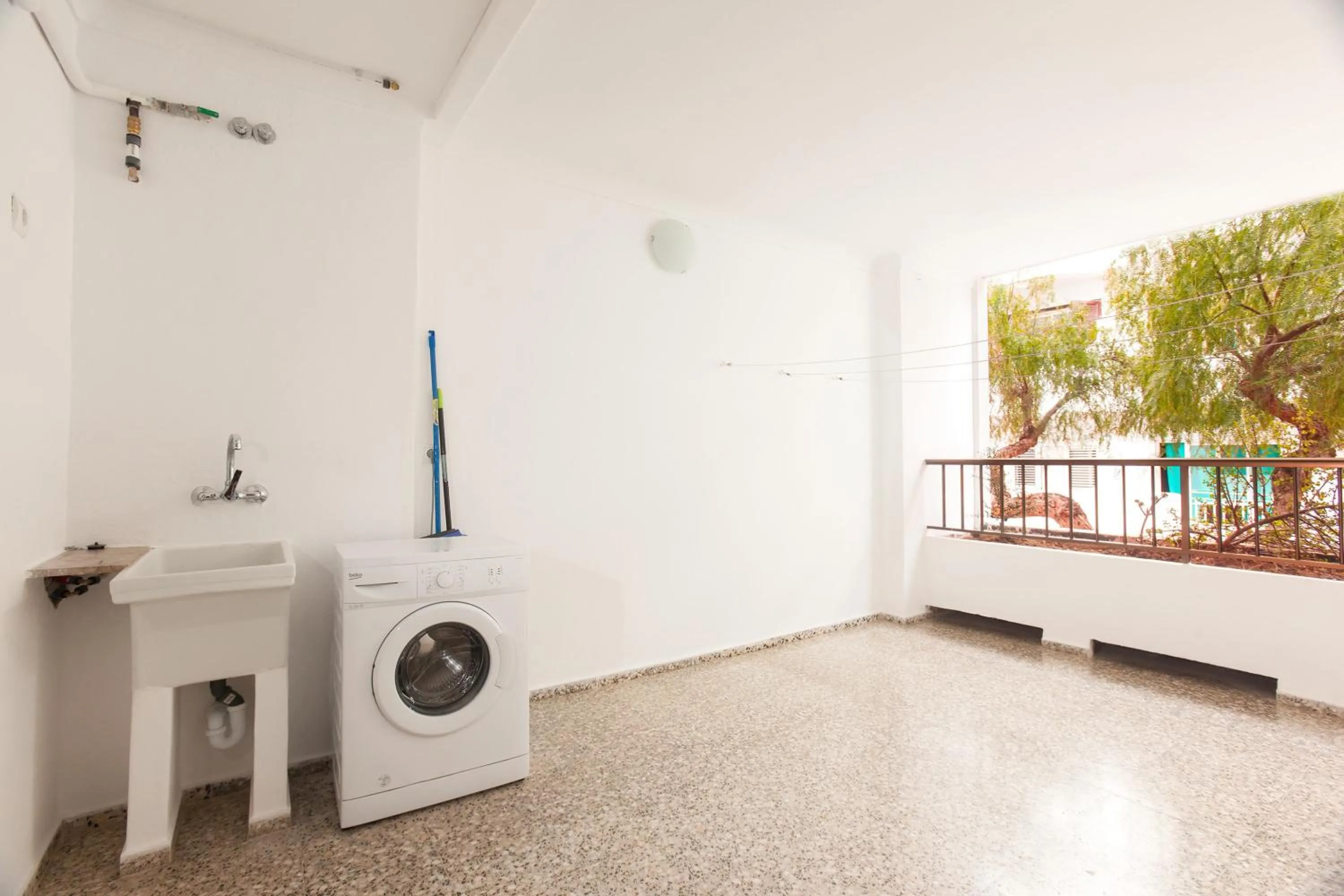 washing machine in Apartamentos Bahia