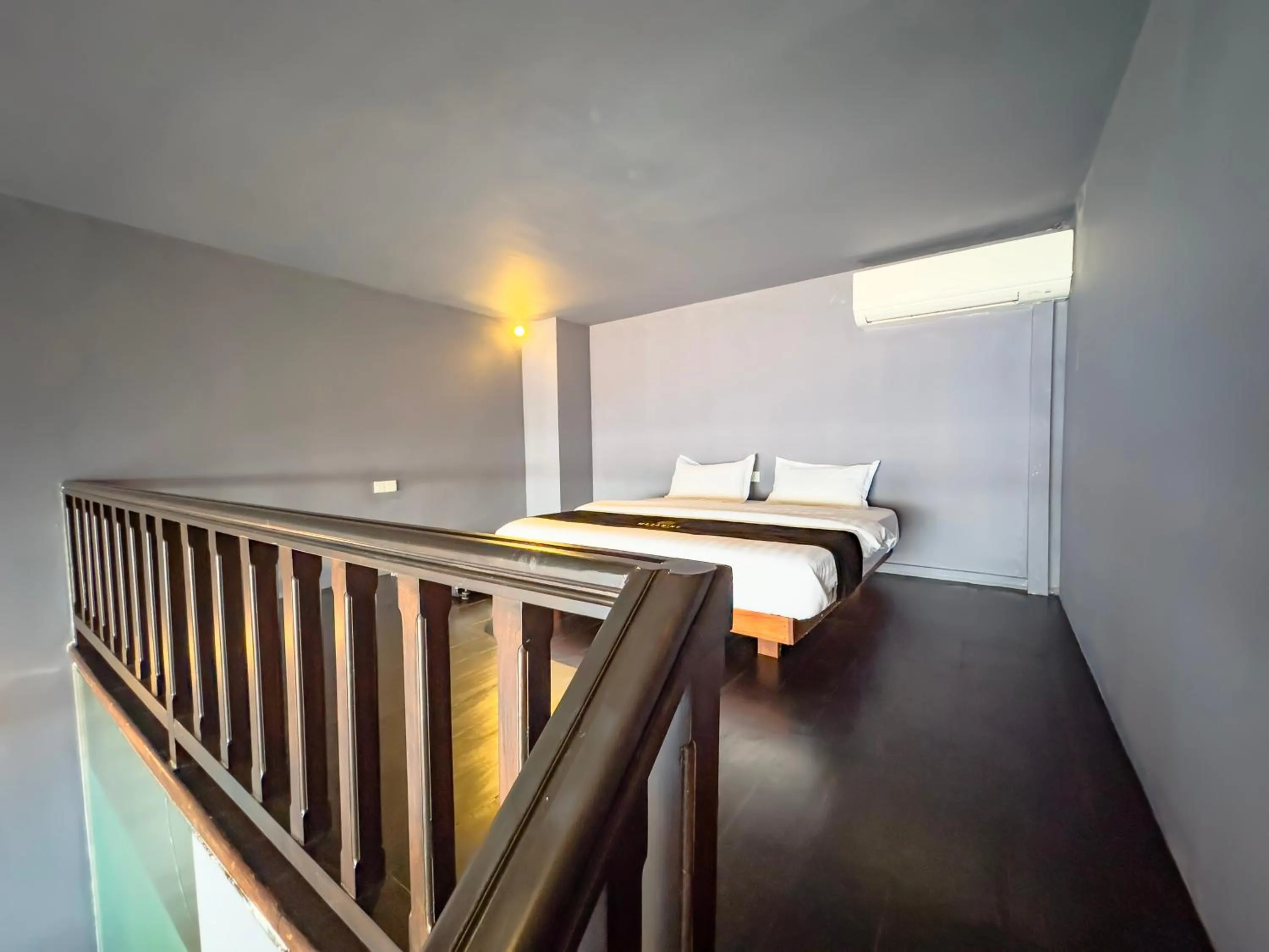 Bed in Mazarine Surf Suites Hiriketiya