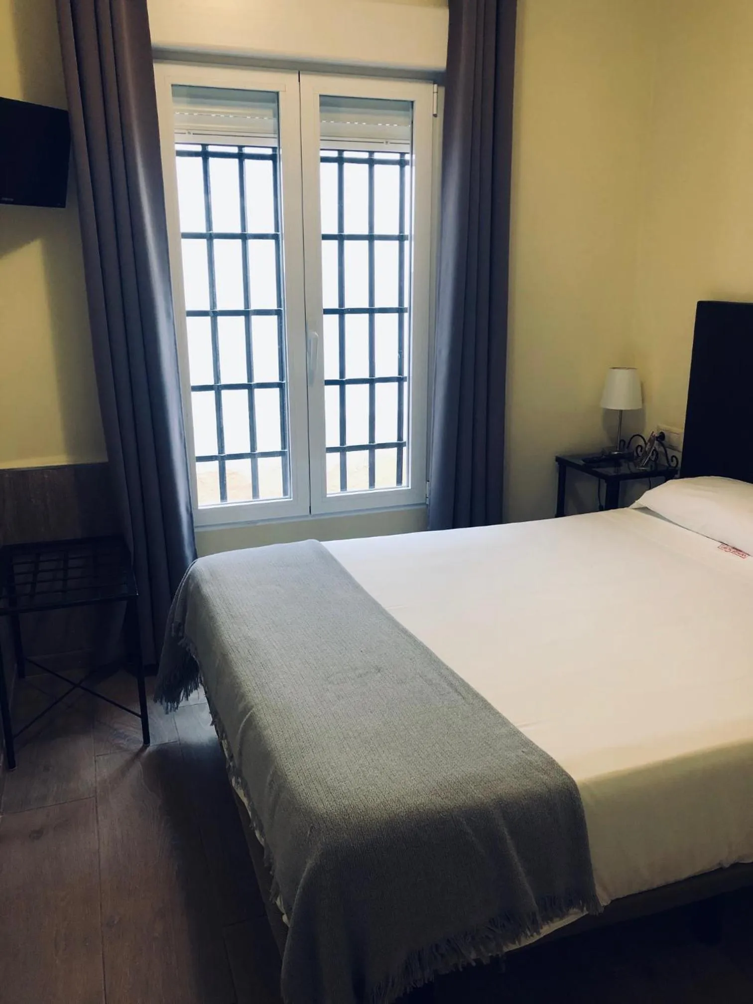 Decorative detail, Bed in Hospedería Luis de Góngora