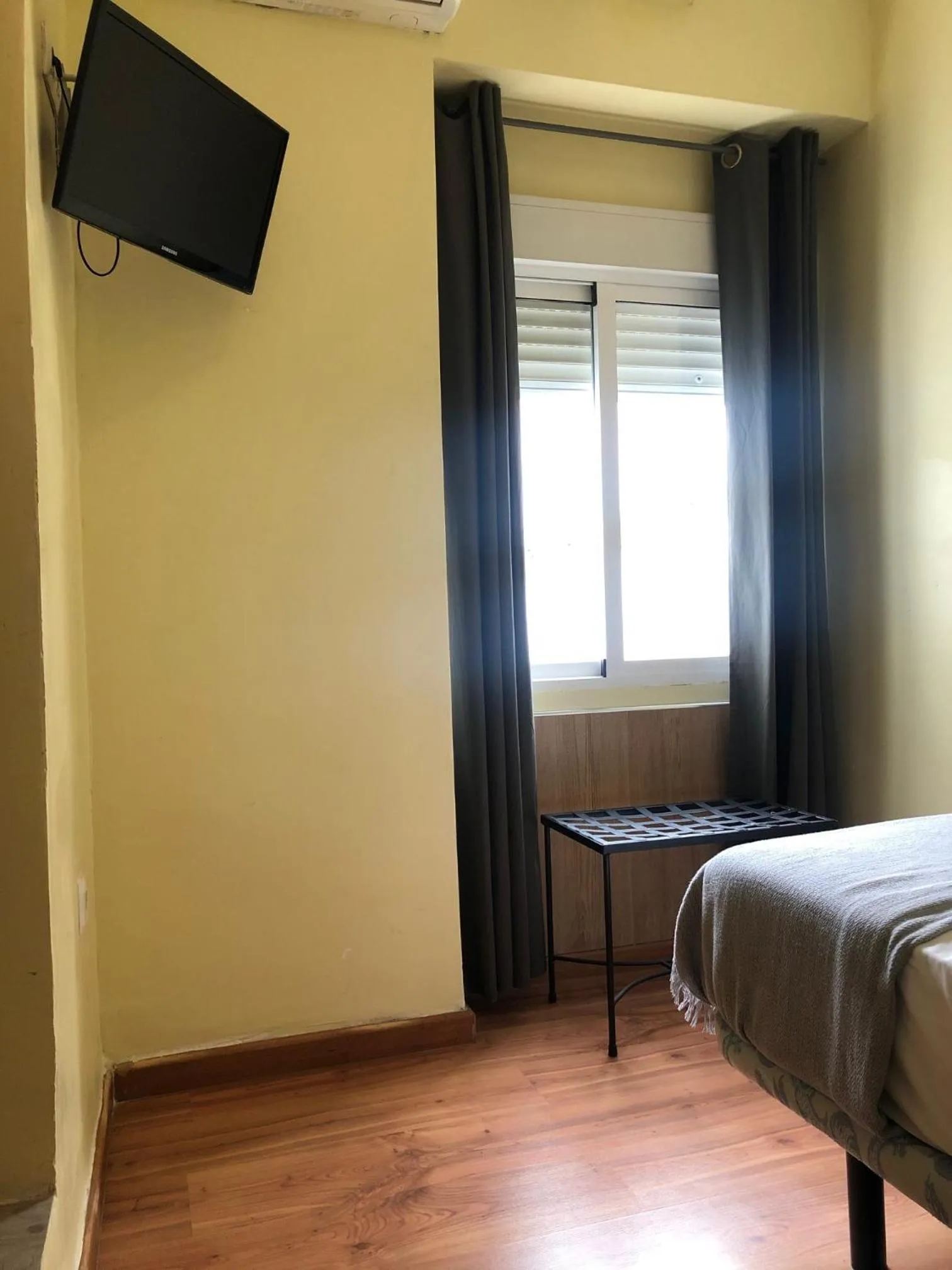 Decorative detail, Bed in Hospedería Luis de Góngora