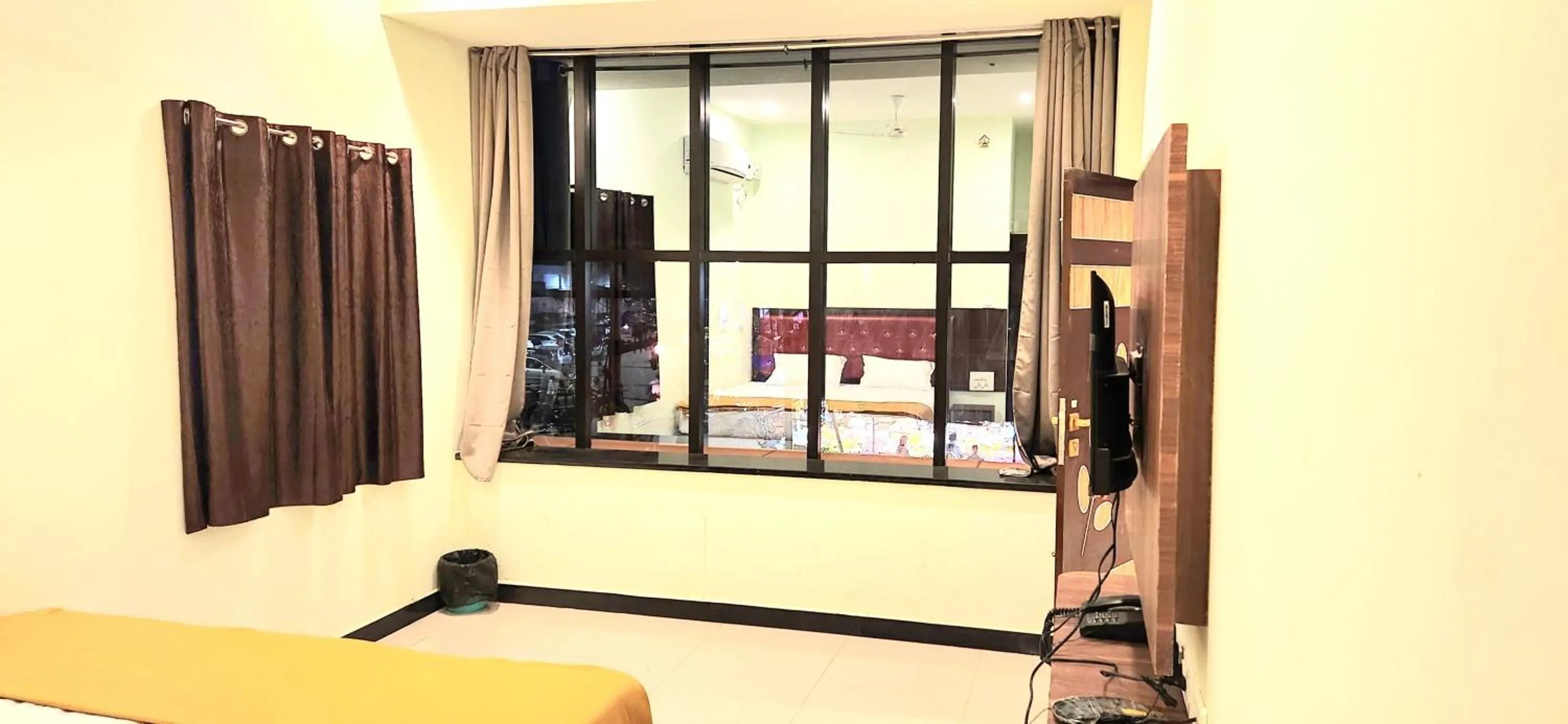 View (from property/room), Bed in Ponni Residency Thanjavur