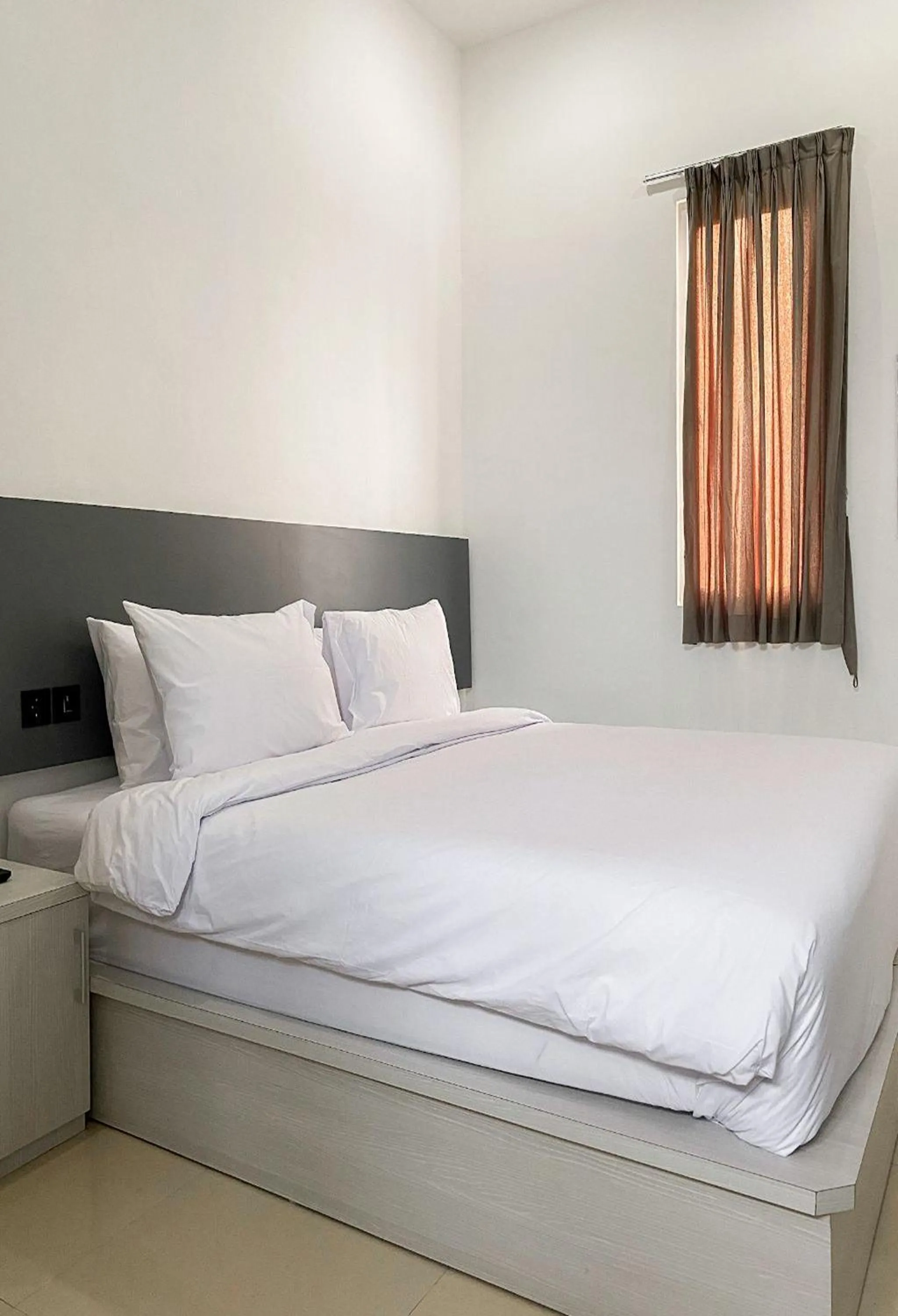 Bed in Binumar Guest House