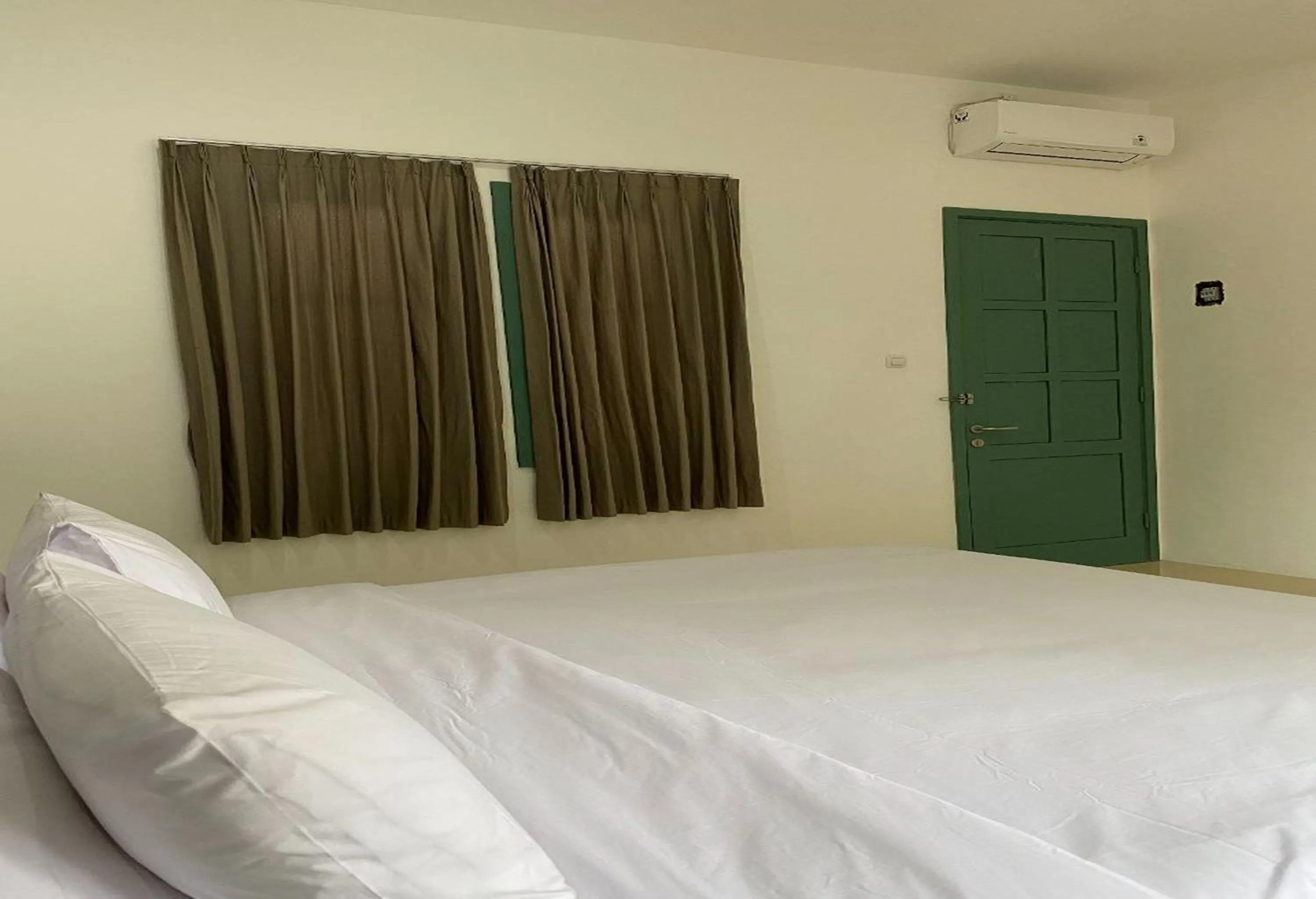 Bed in Binumar Guest House