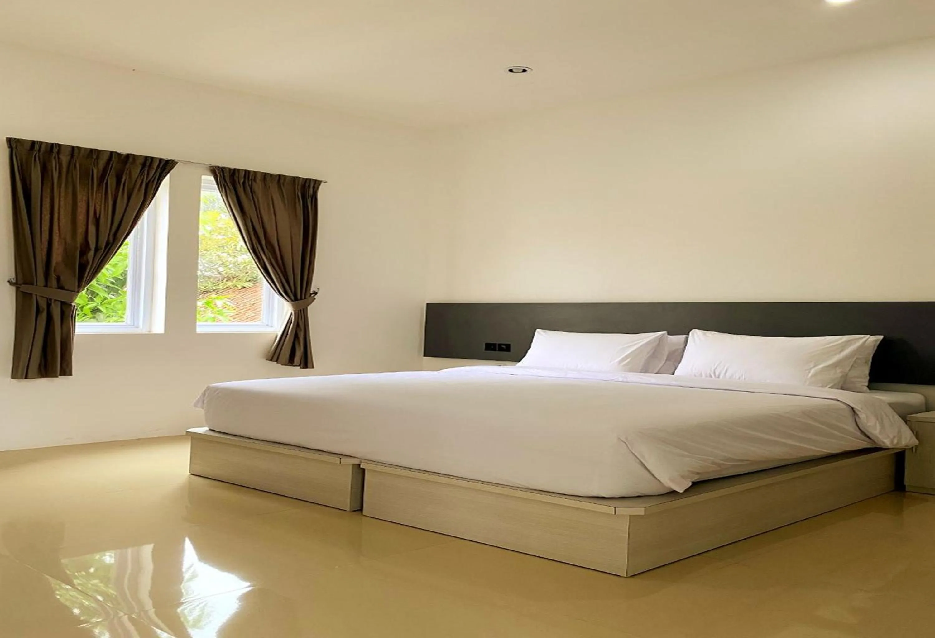 Bed in Binumar Guest House