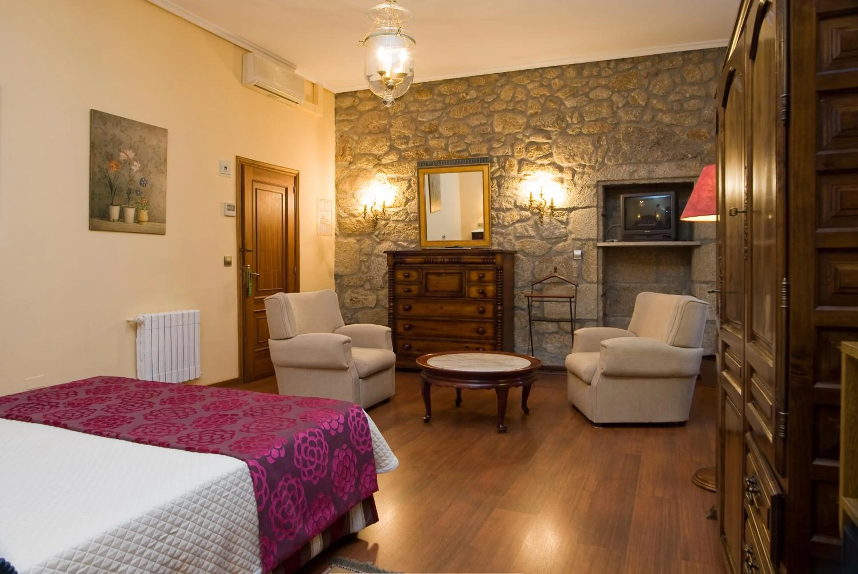 Seating area, Bed in Hotel Pazo O Rial