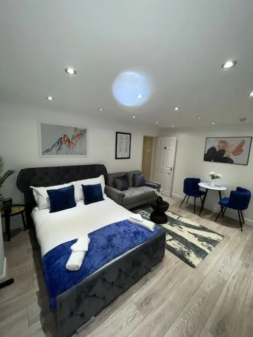 Bed in Stylish Cosy Studio Apartment