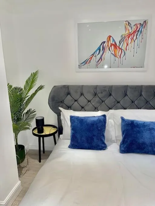 Bed in Stylish Cosy Studio Apartment