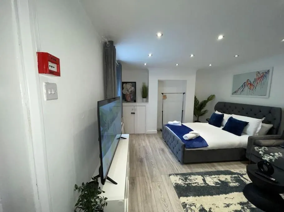 Bed in Stylish Cosy Studio Apartment