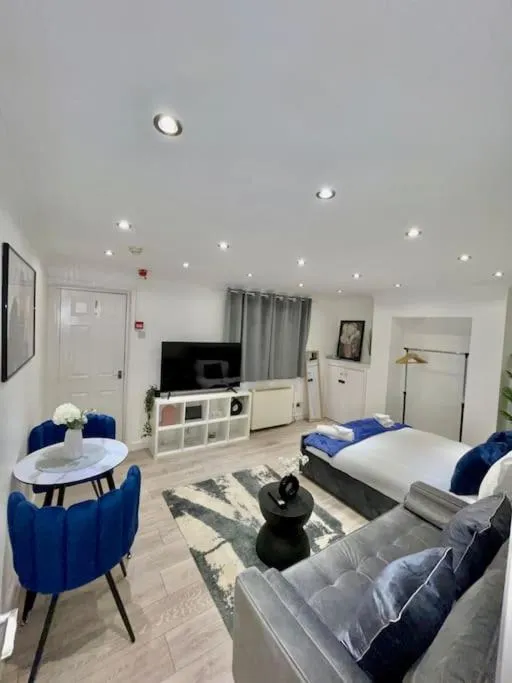 Bed in Stylish Cosy Studio Apartment