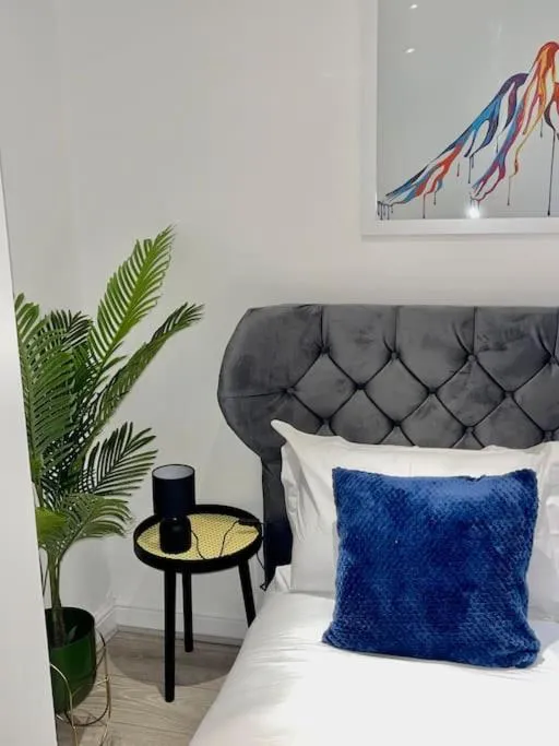 Bed in Stylish Cosy Studio Apartment