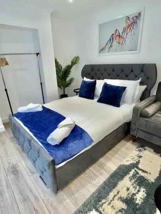 Bed in Stylish Cosy Studio Apartment