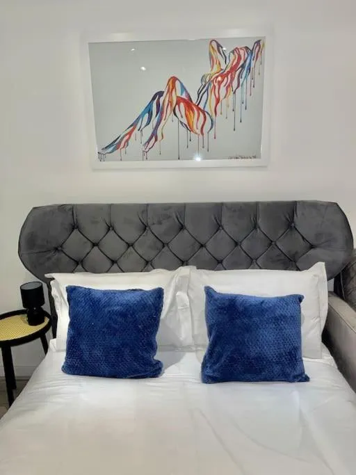 Bed in Stylish Cosy Studio Apartment