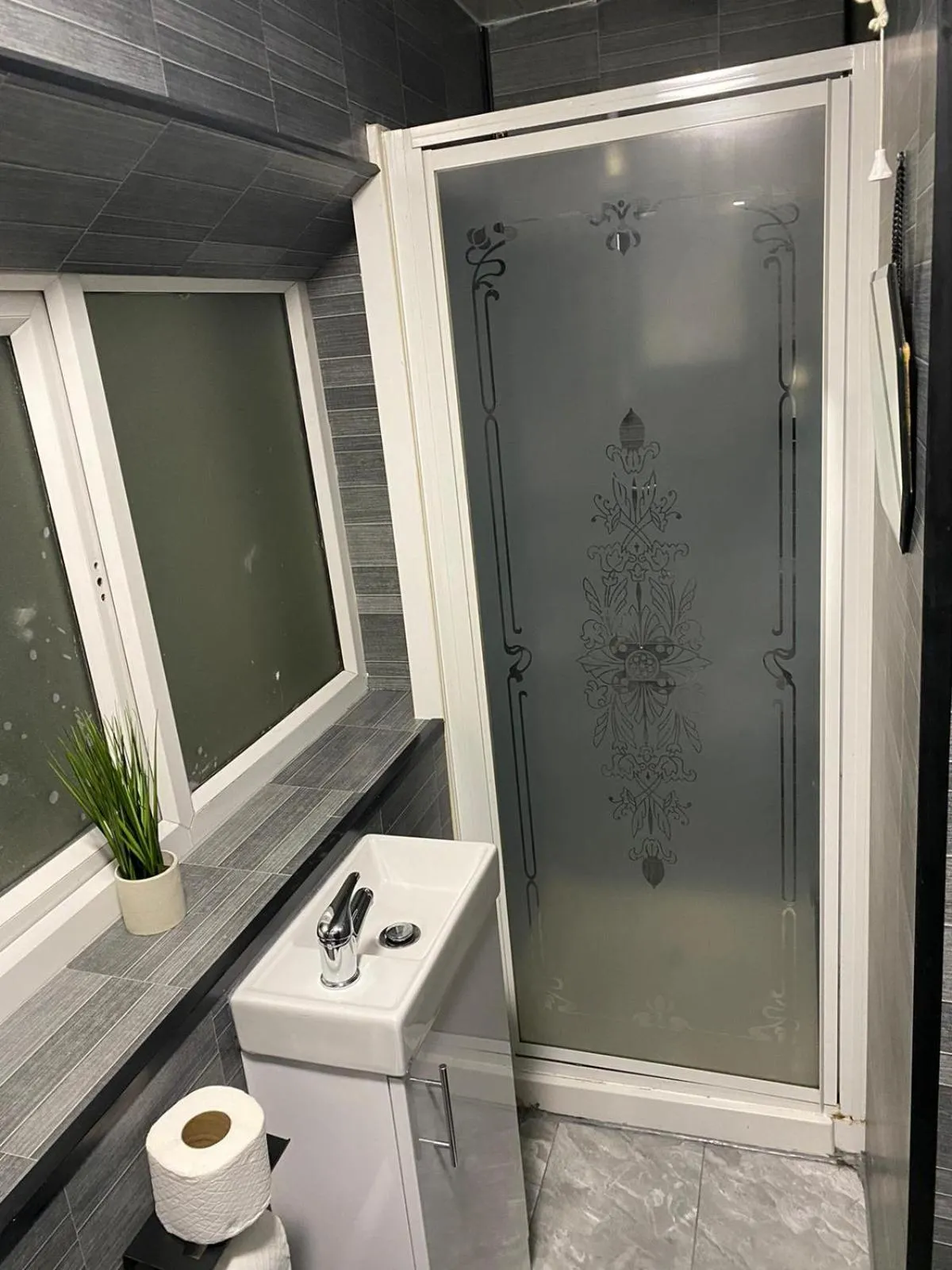 Bathroom in Black Ocean Holiday Apartments