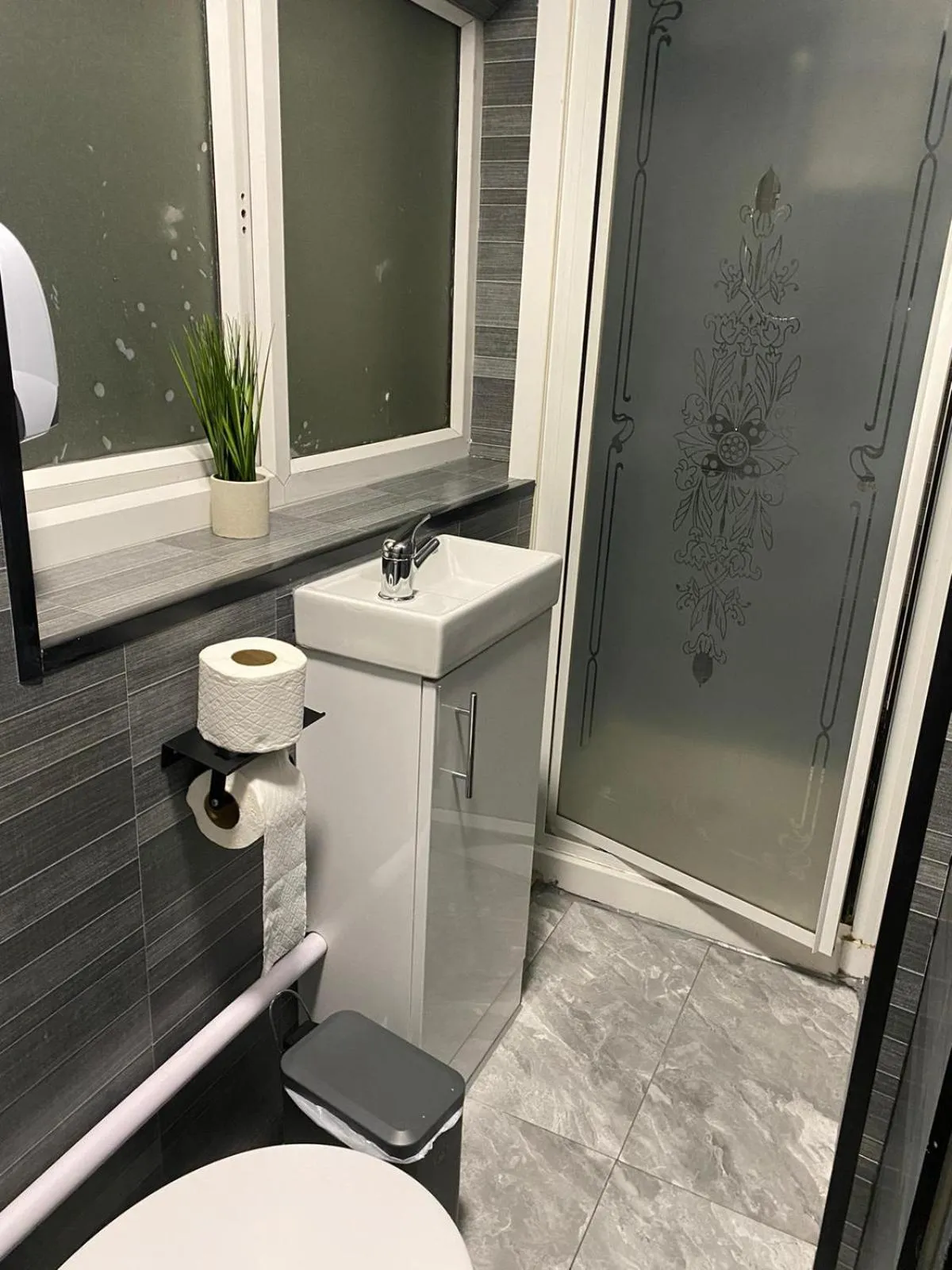 Bathroom in Black Ocean Holiday Apartments