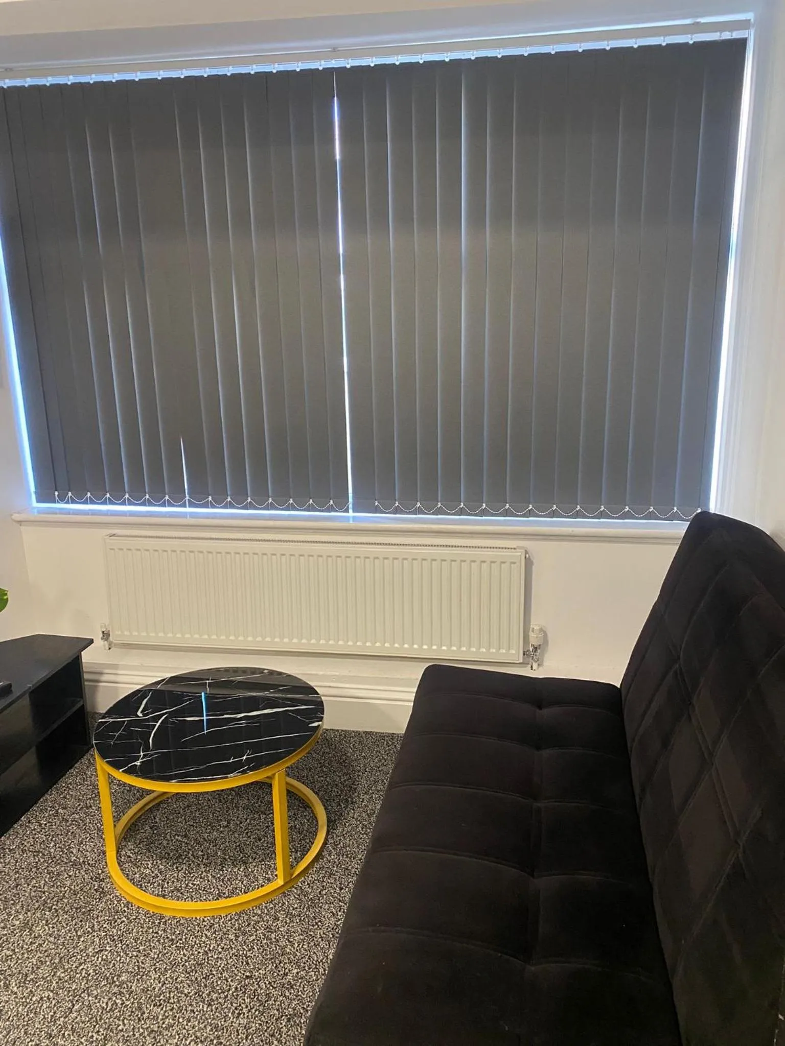 Living room in Black Ocean Holiday Apartments