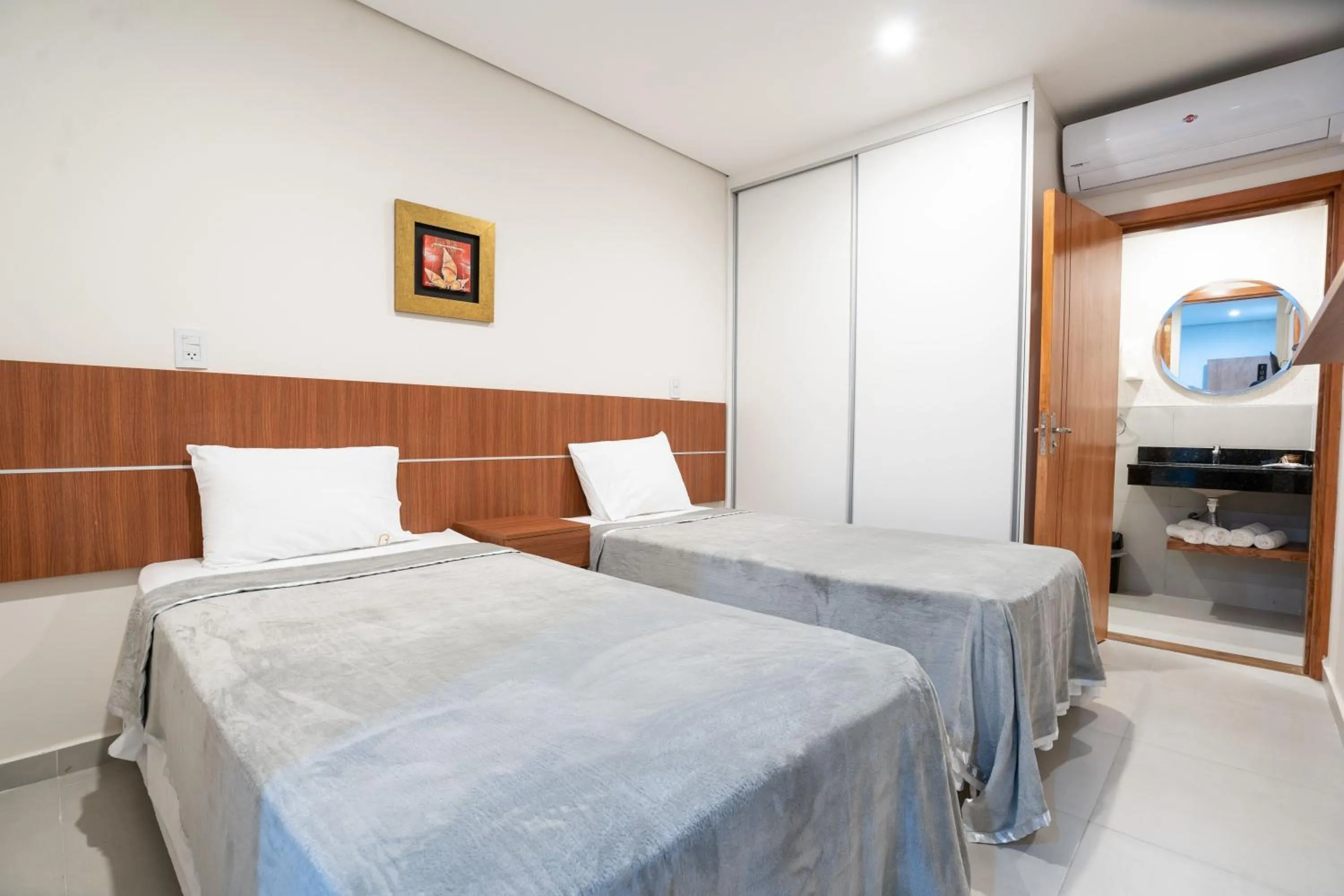 Bed in VIVARIUM APART HOTEL