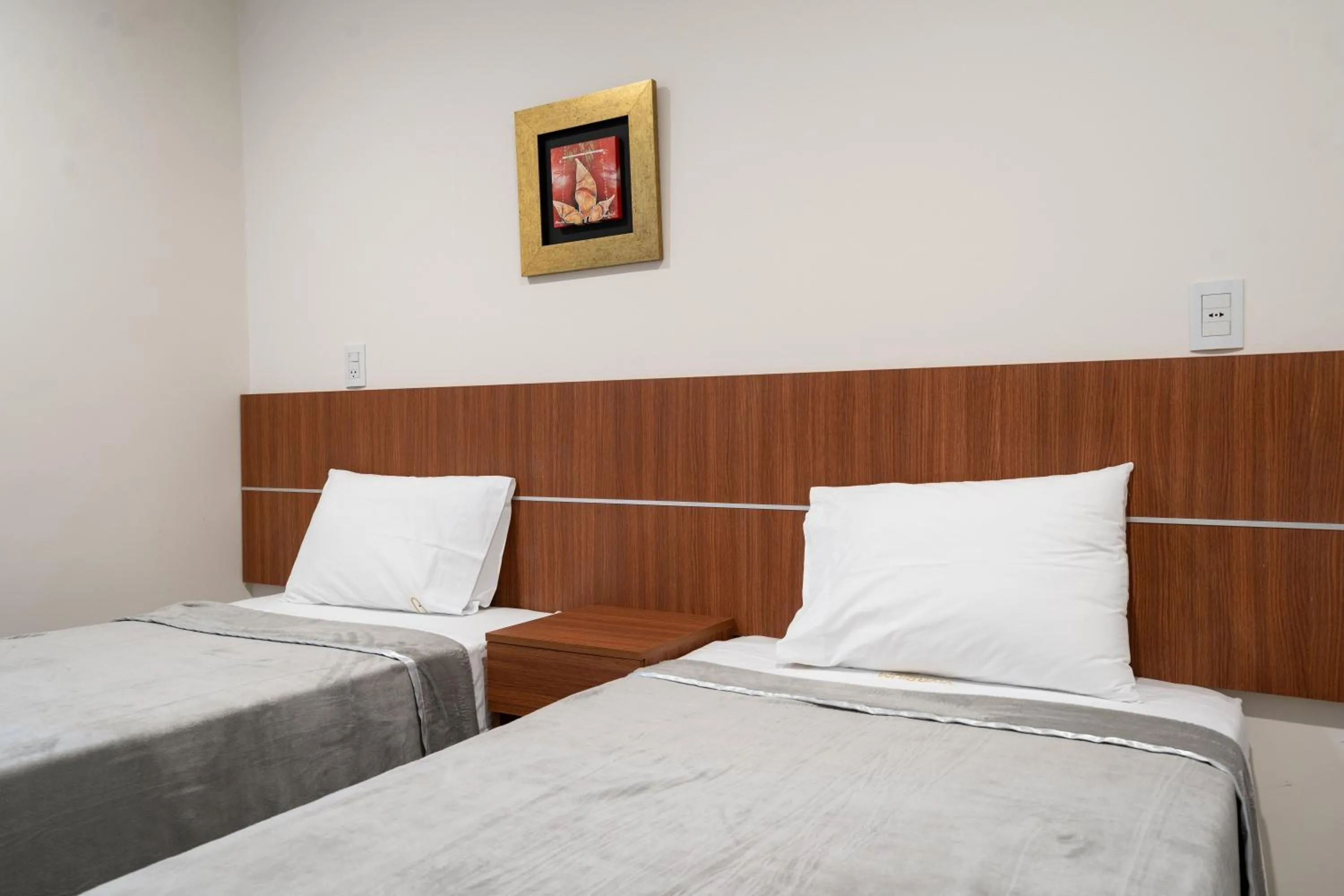 Bed in VIVARIUM APART HOTEL