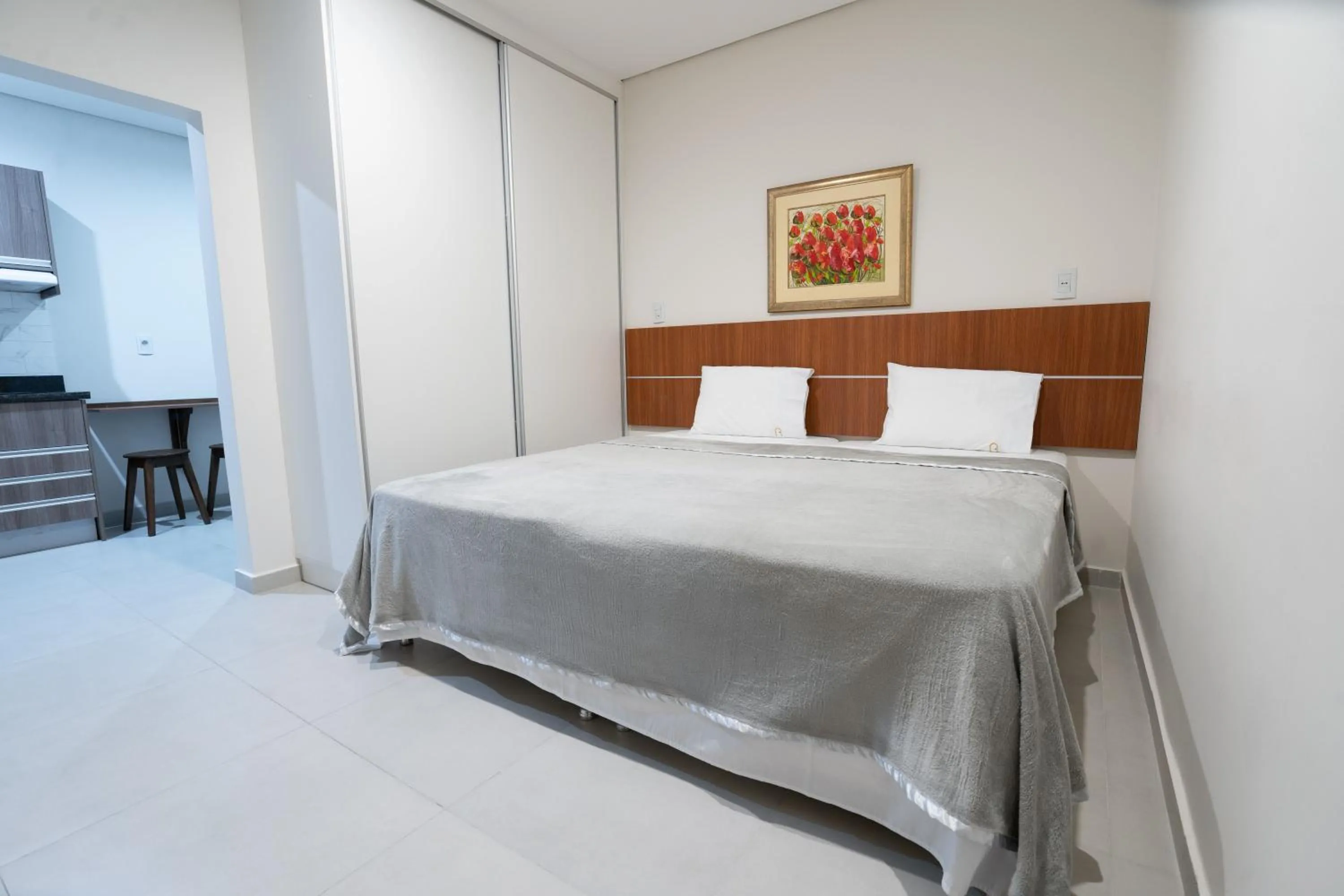 Bed in VIVARIUM APART HOTEL