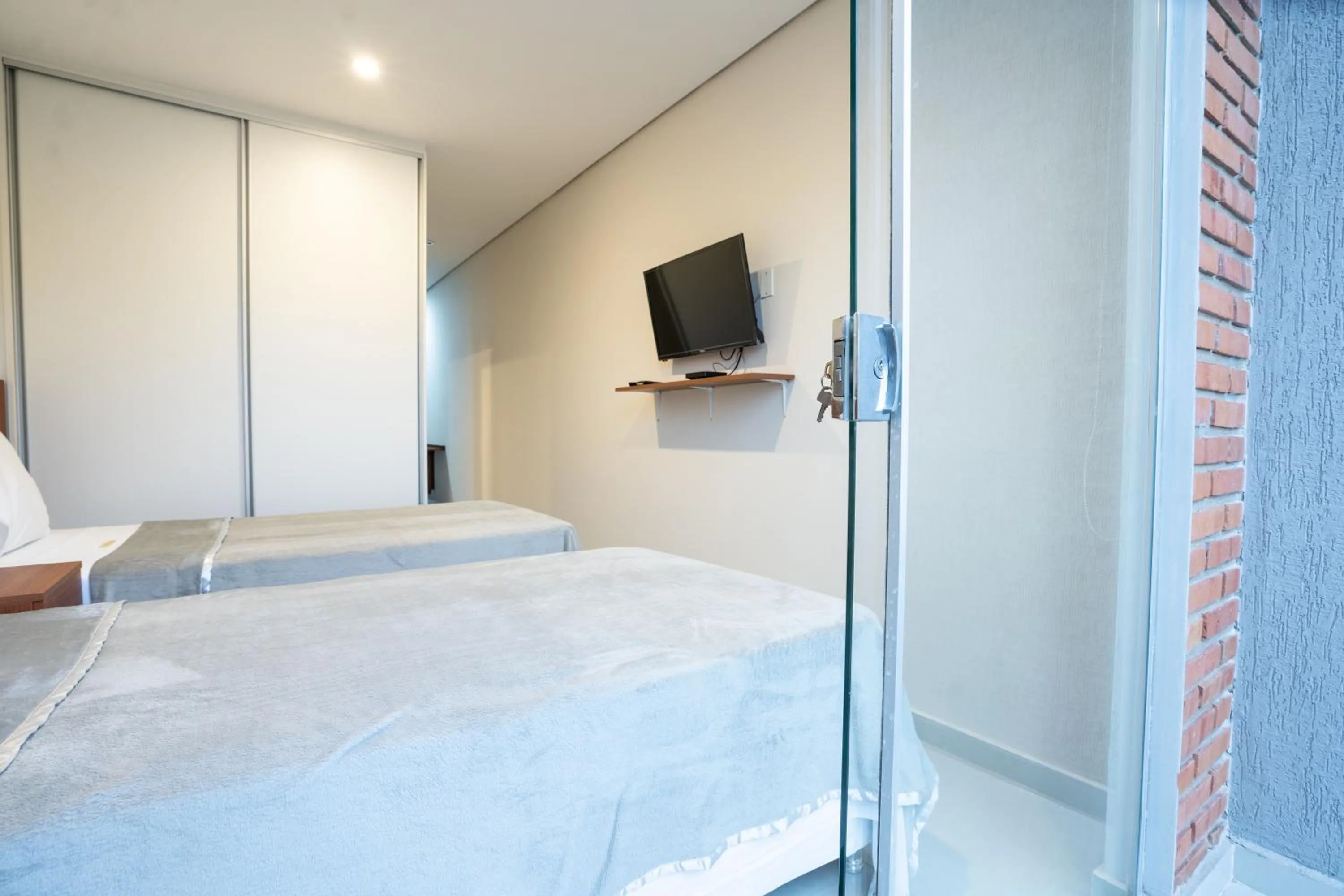 Bed in VIVARIUM APART HOTEL