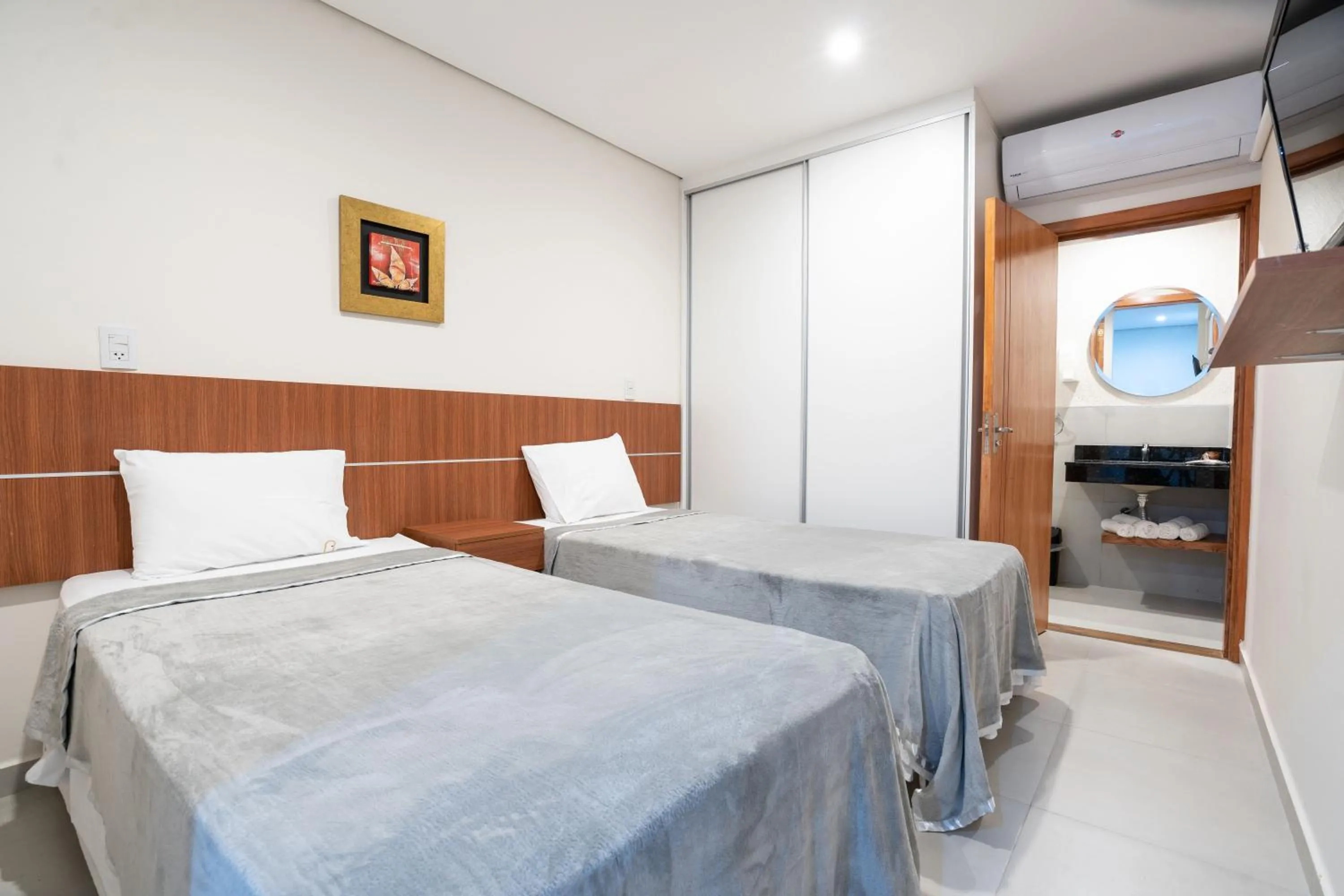 Bed in VIVARIUM APART HOTEL