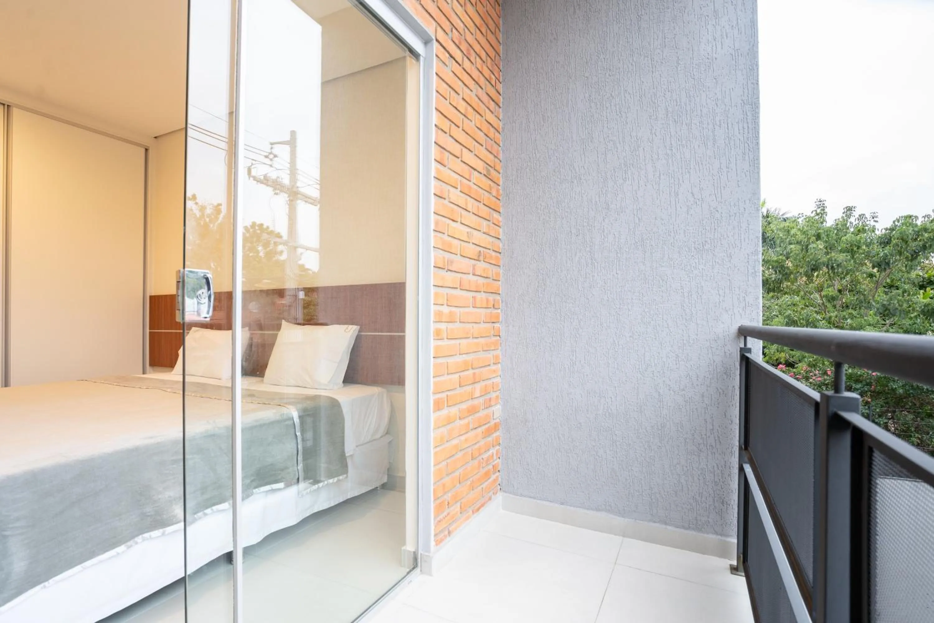 Bed in VIVARIUM APART HOTEL