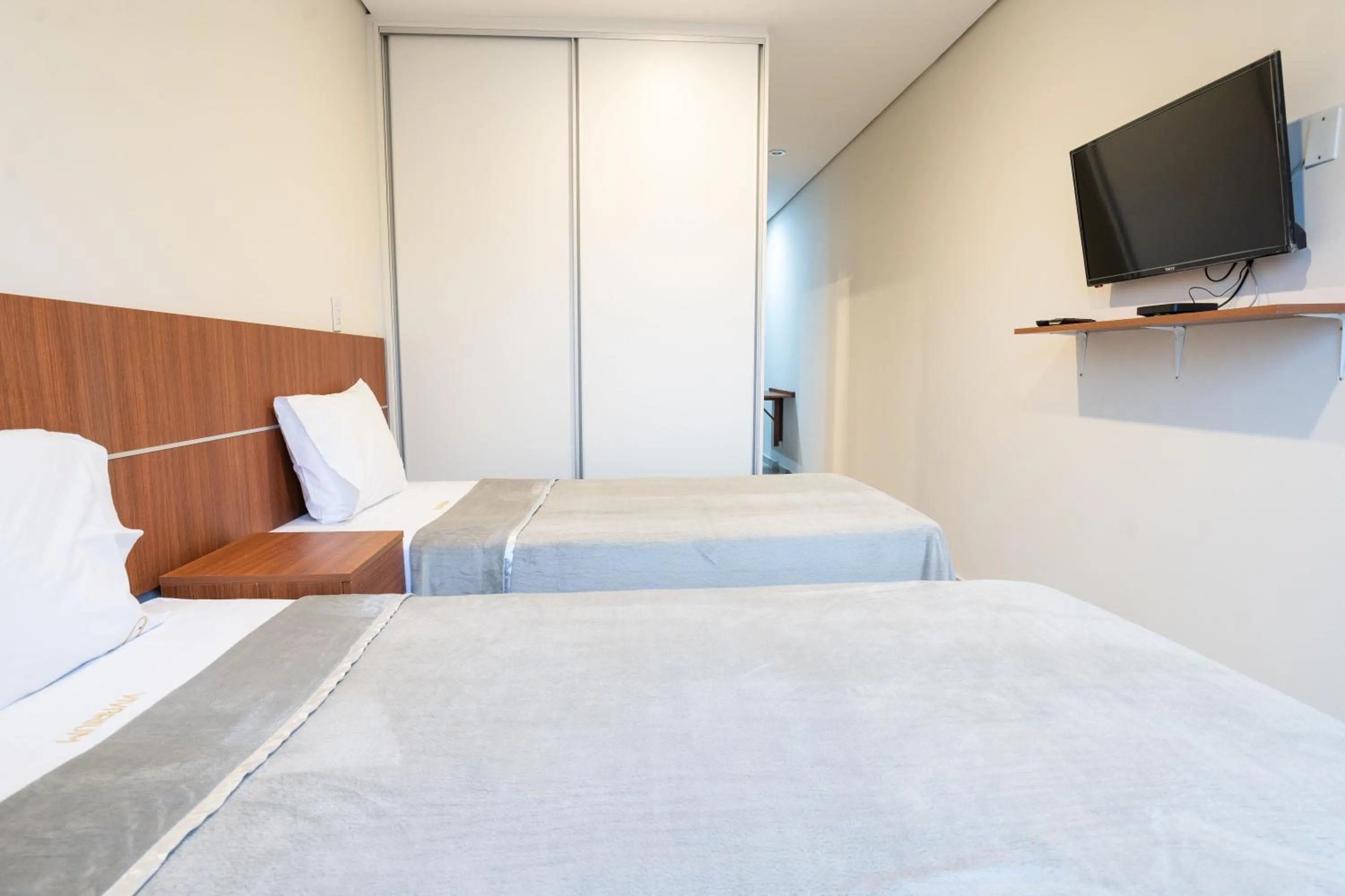 Bed in VIVARIUM APART HOTEL