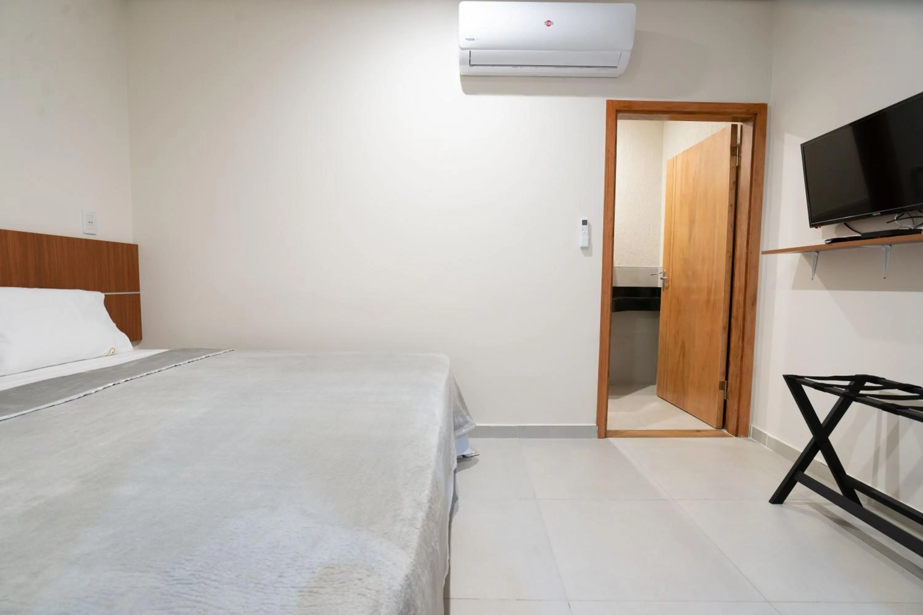 Bed in VIVARIUM APART HOTEL