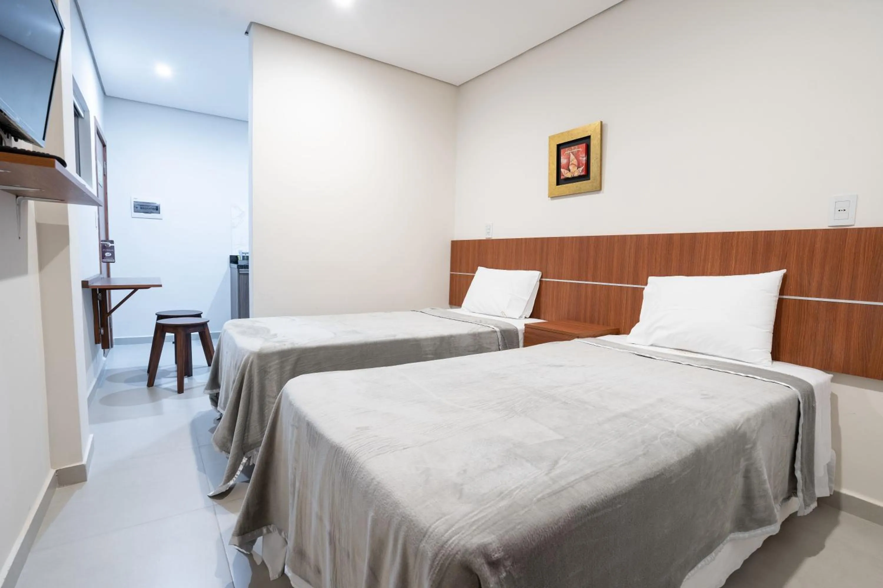 Bed in VIVARIUM APART HOTEL