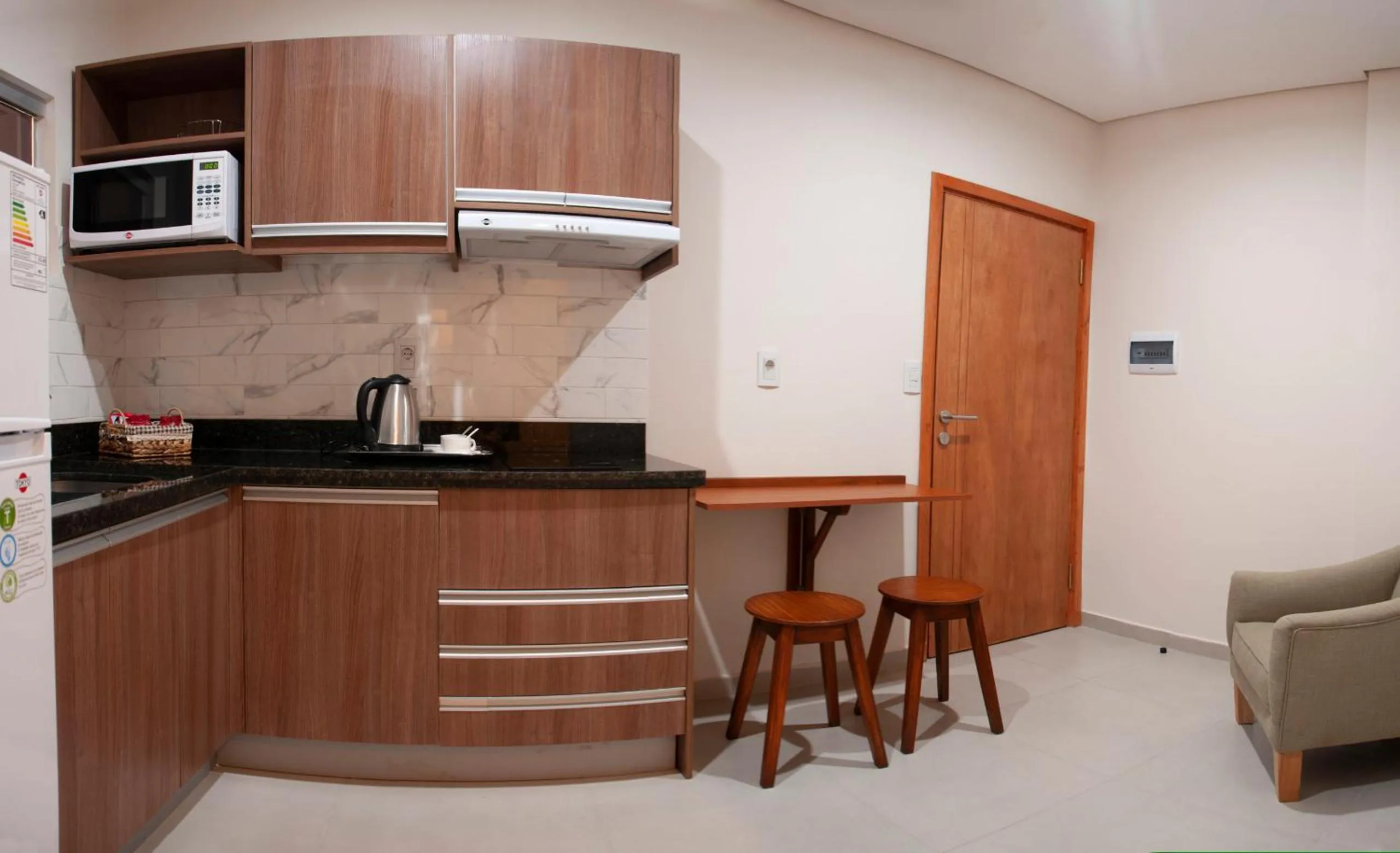 Kitchen or kitchenette in VIVARIUM APART HOTEL