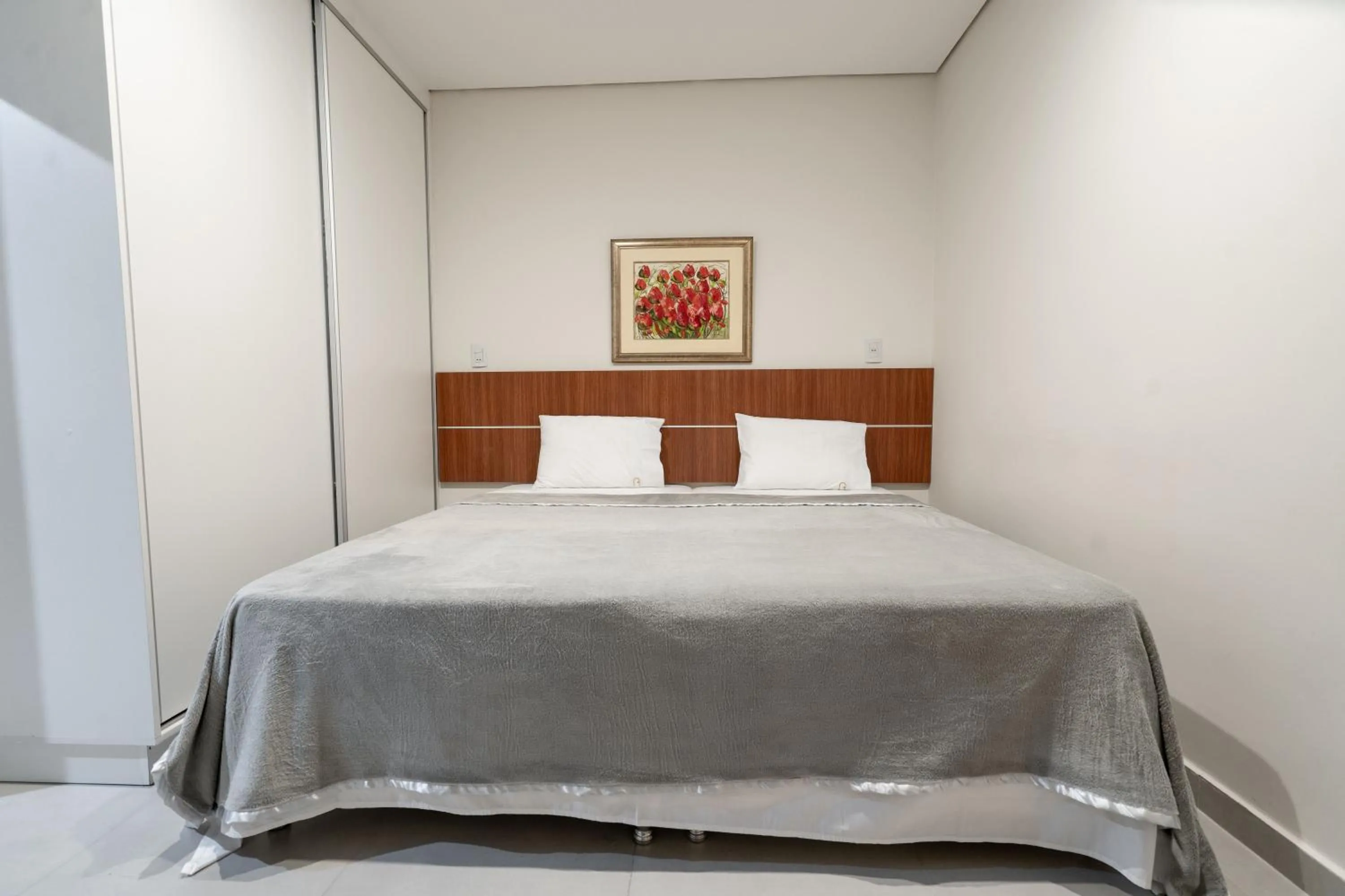 Bed in VIVARIUM APART HOTEL