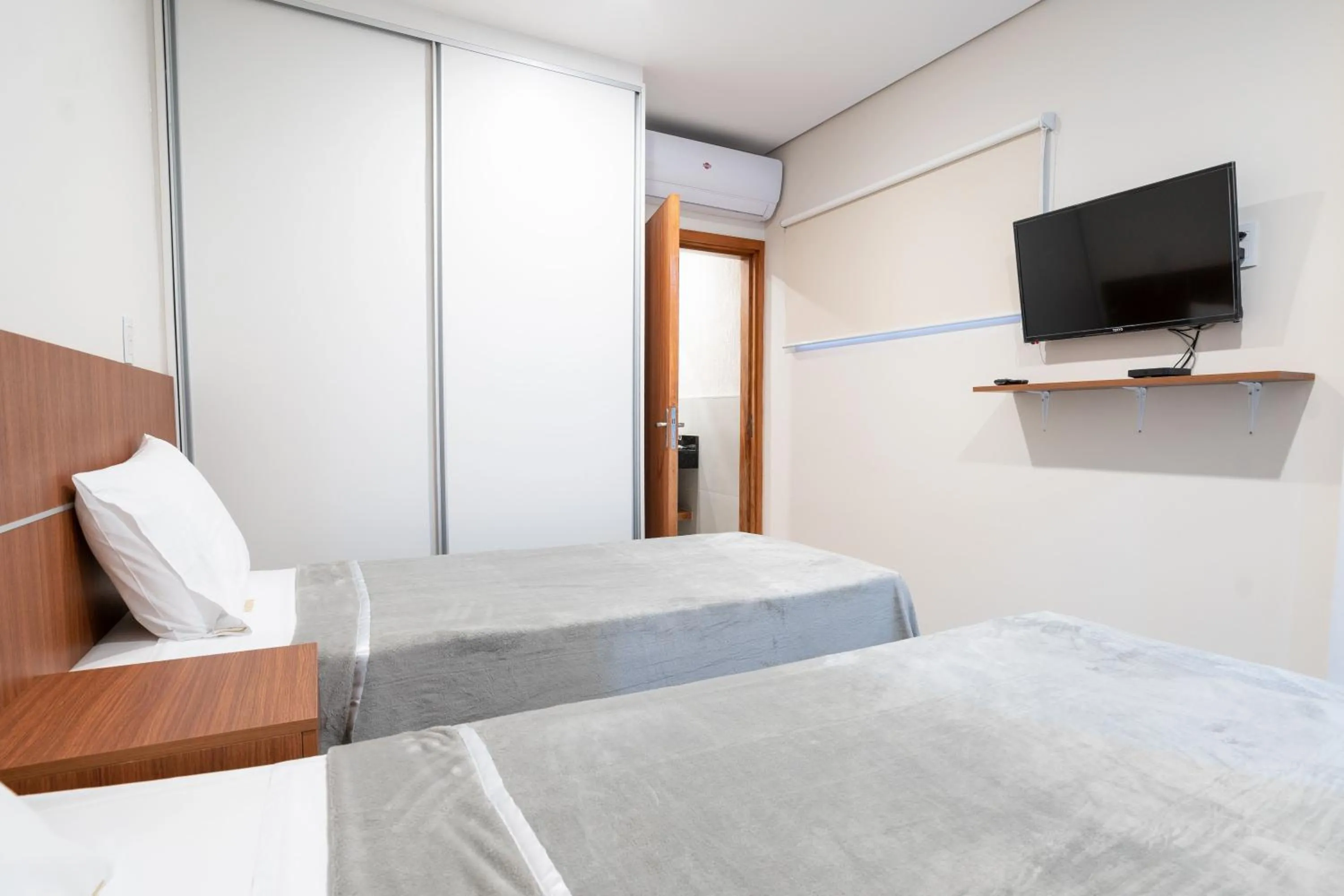 Bed in VIVARIUM APART HOTEL
