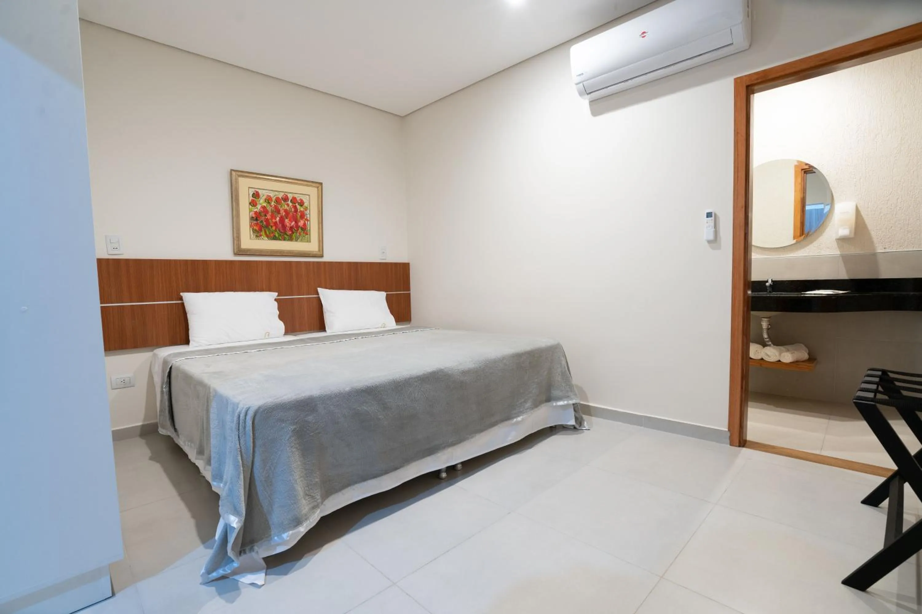 Bed in VIVARIUM APART HOTEL