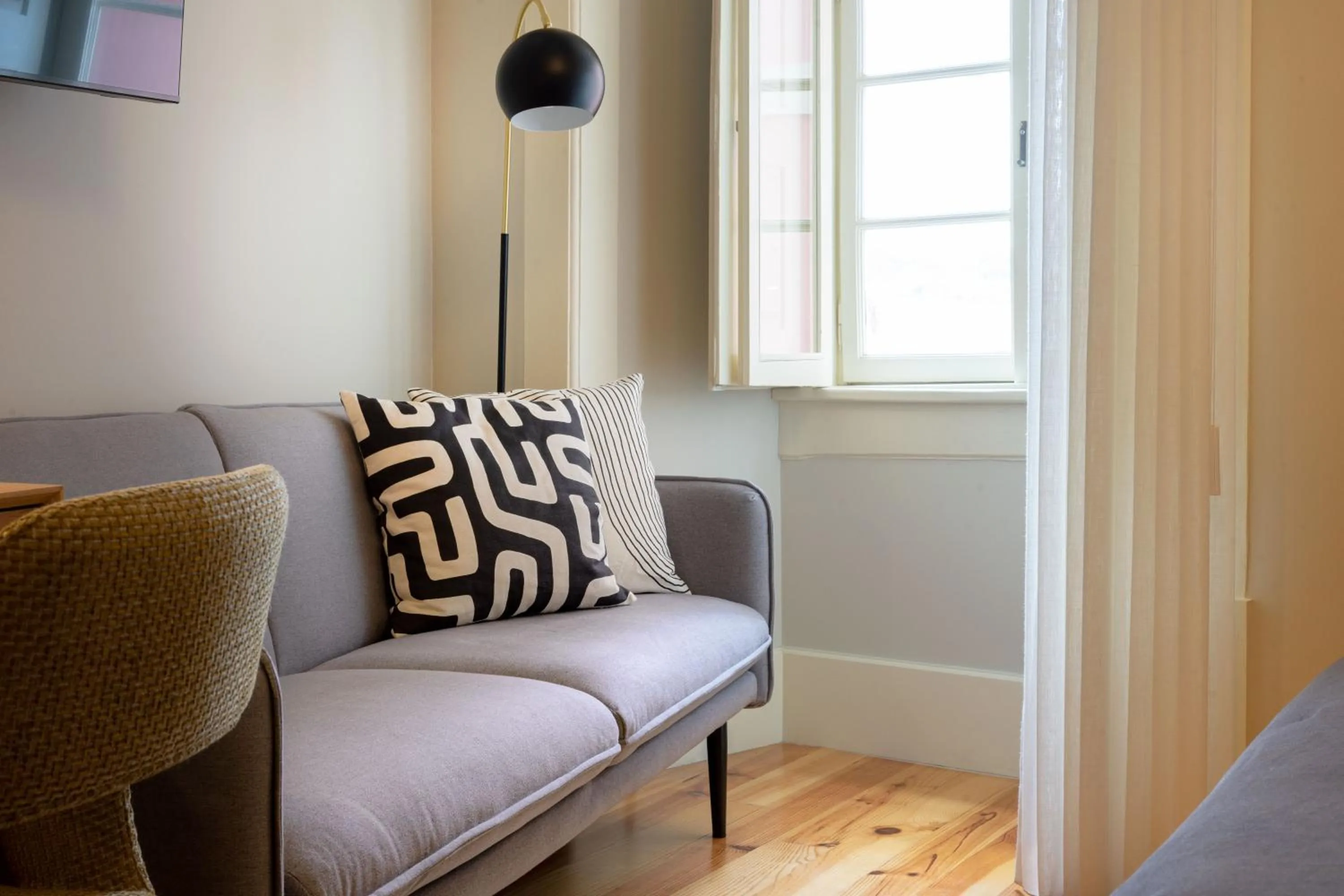 Seating area in Entre Ruas Apartments