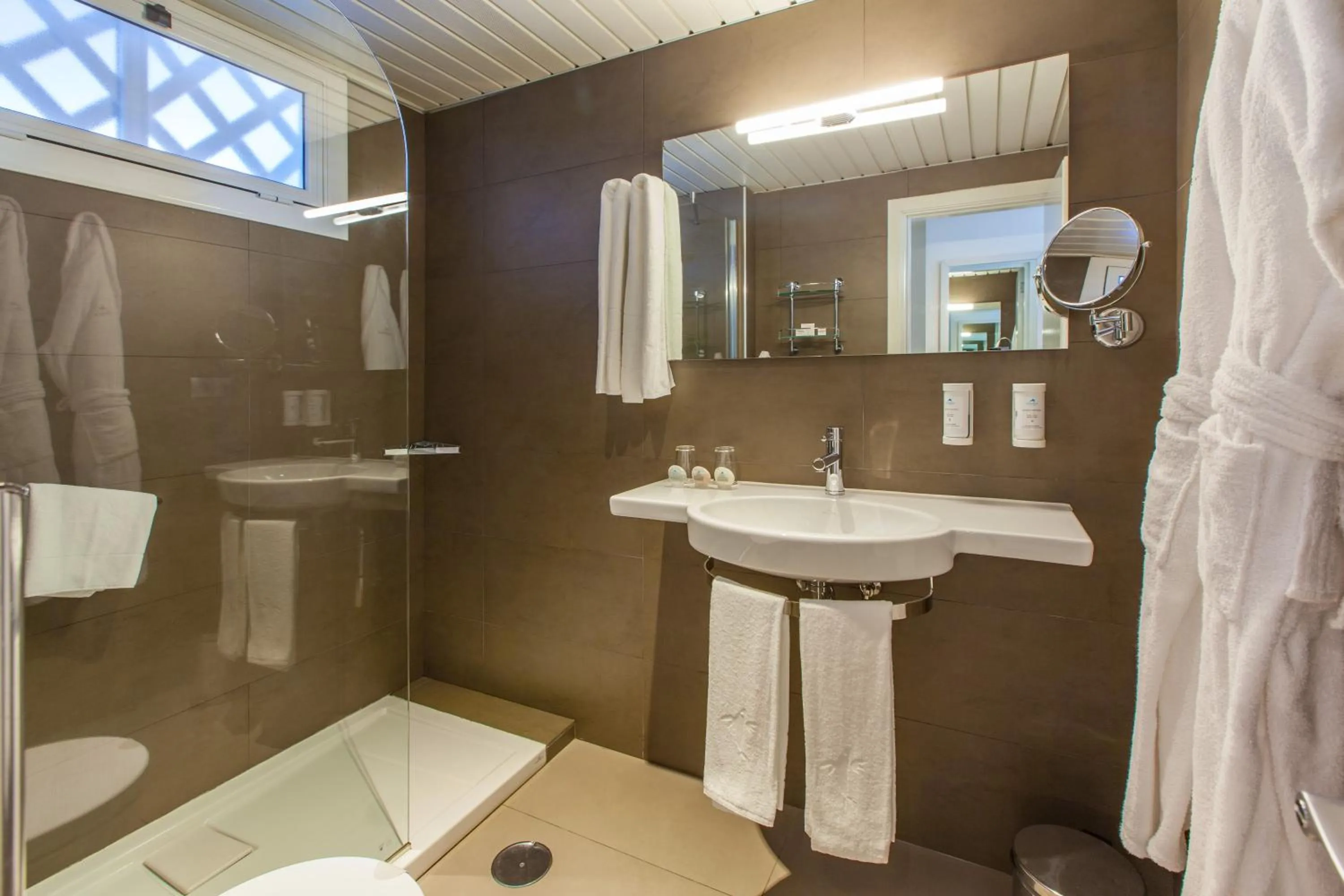 Bathroom in Corallium Beach by Lopesan Hotels - Adults Only