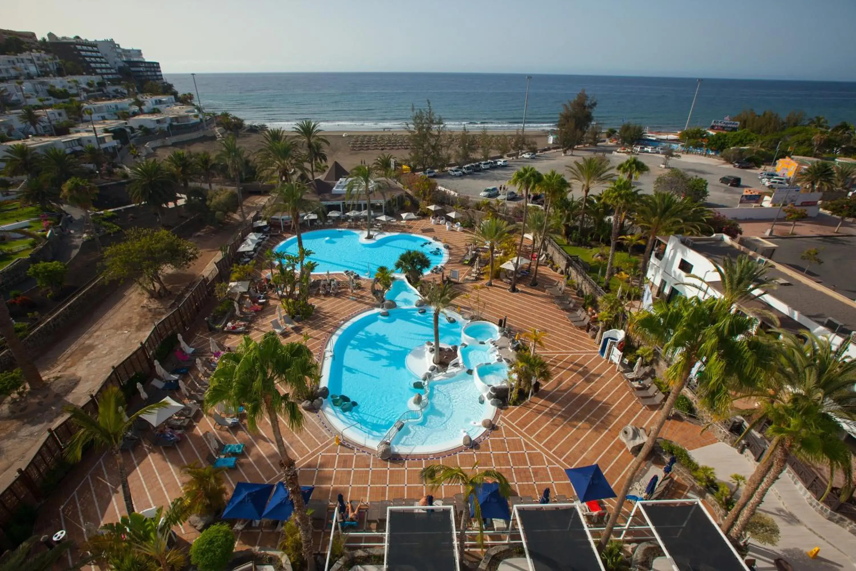 Swimming pool in Corallium Beach by Lopesan Hotels - Adults Only Swimming pool in Corallium Beach by Lopesan Hotels - Adults Only
