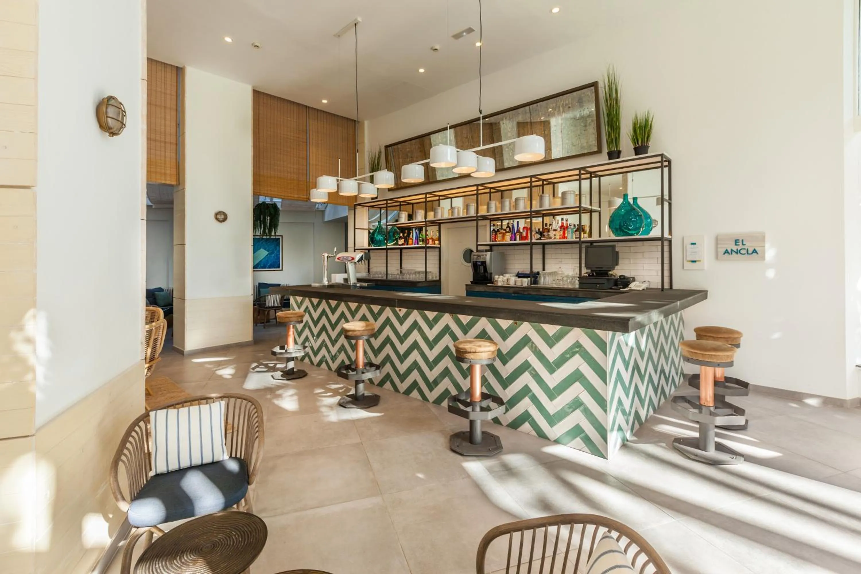 Lounge or bar in Corallium Beach by Lopesan Hotels - Adults Only