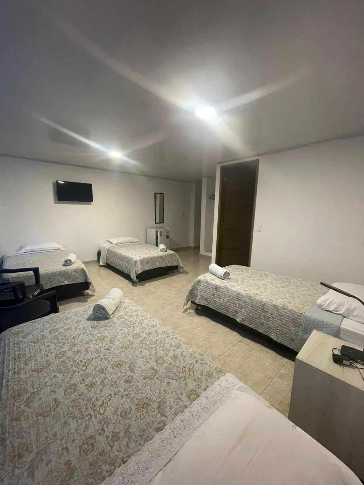 Bed in BLUE ISLAND HOTEL