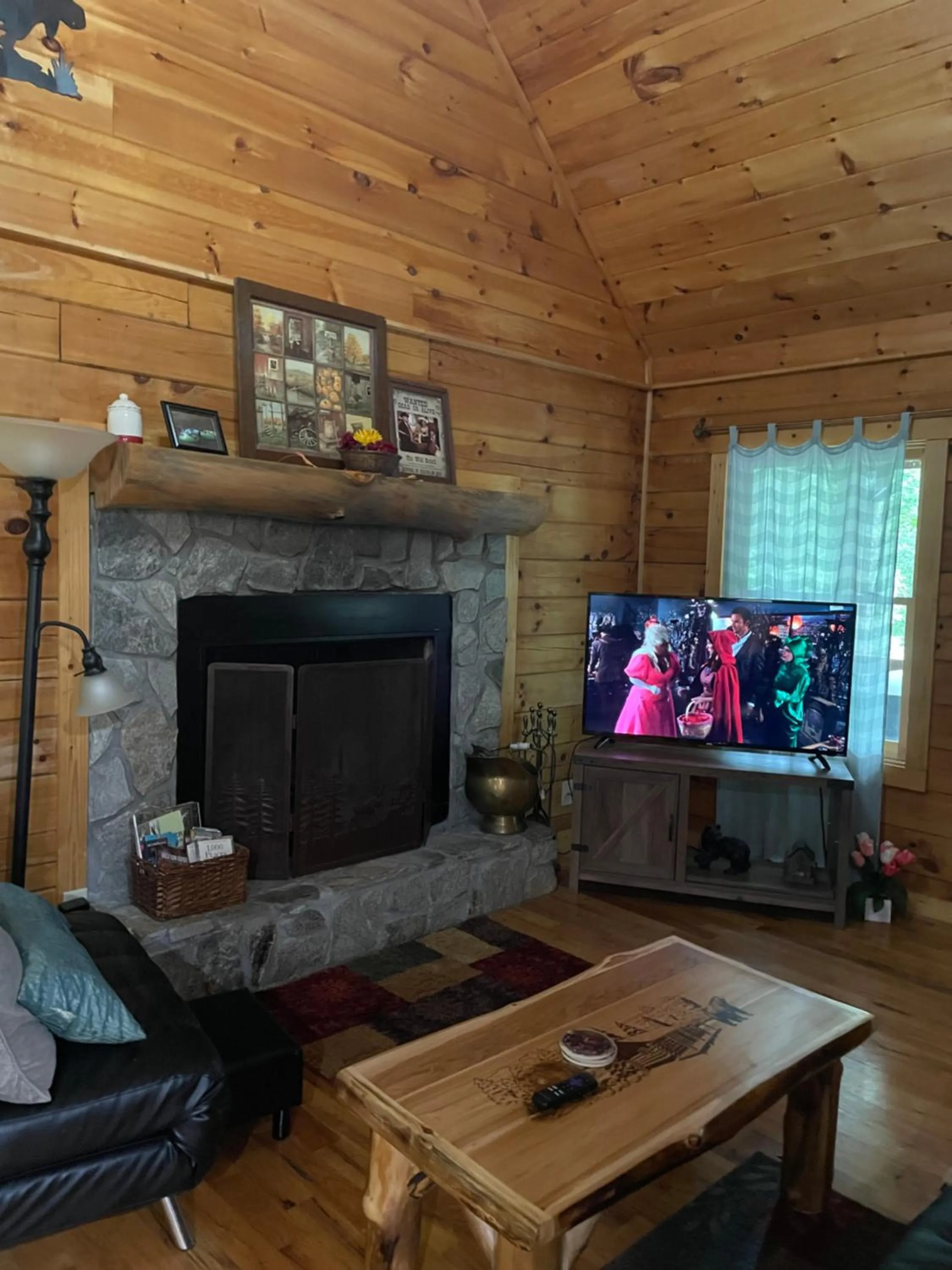 Living room in Alpenhaus Cabins Real Log Home in Helen Ga Mountains with hot tub and balconies
