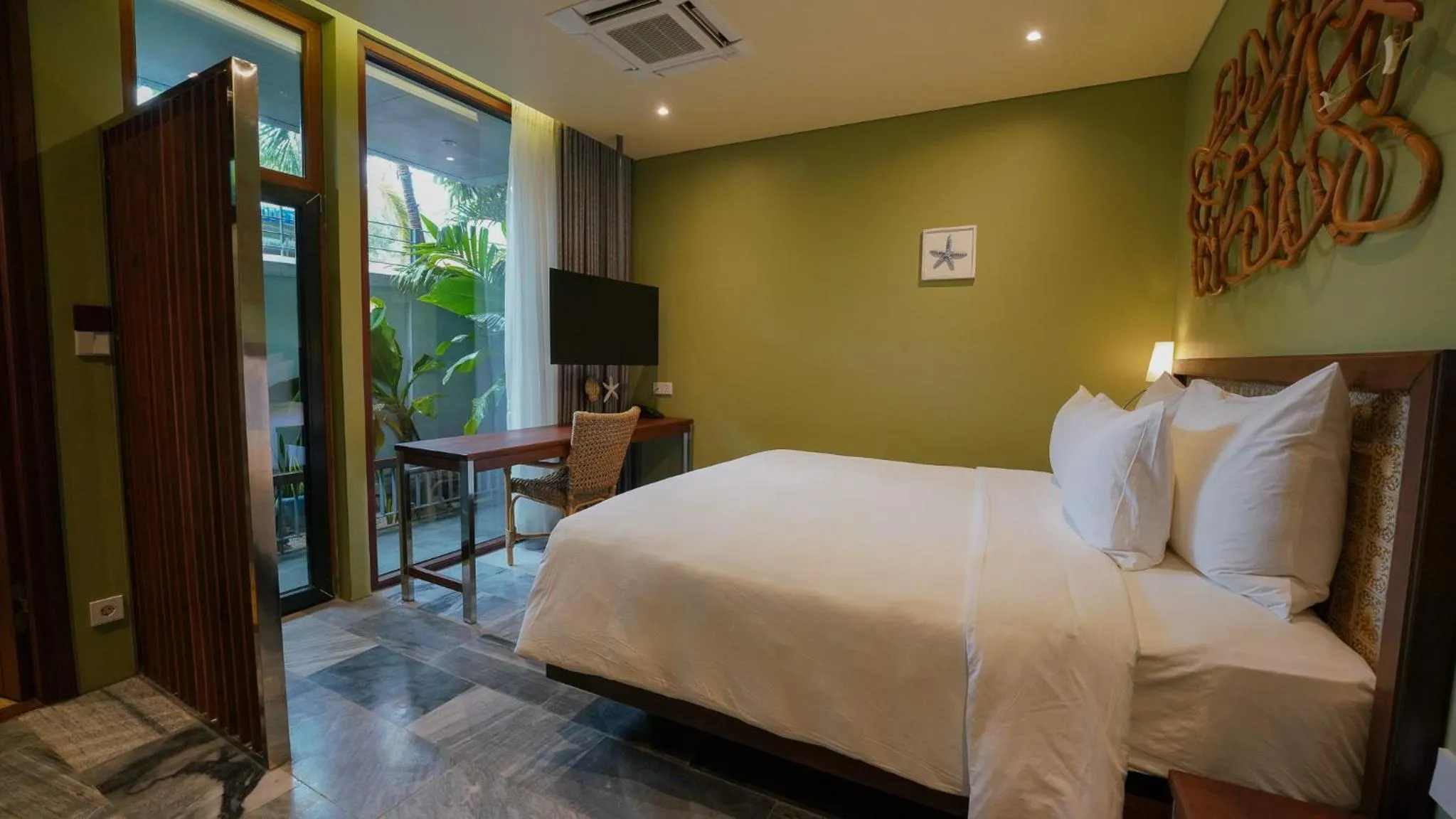Bed in CHiEM HoiAn - The Beachside Boutique Hotel & Villa