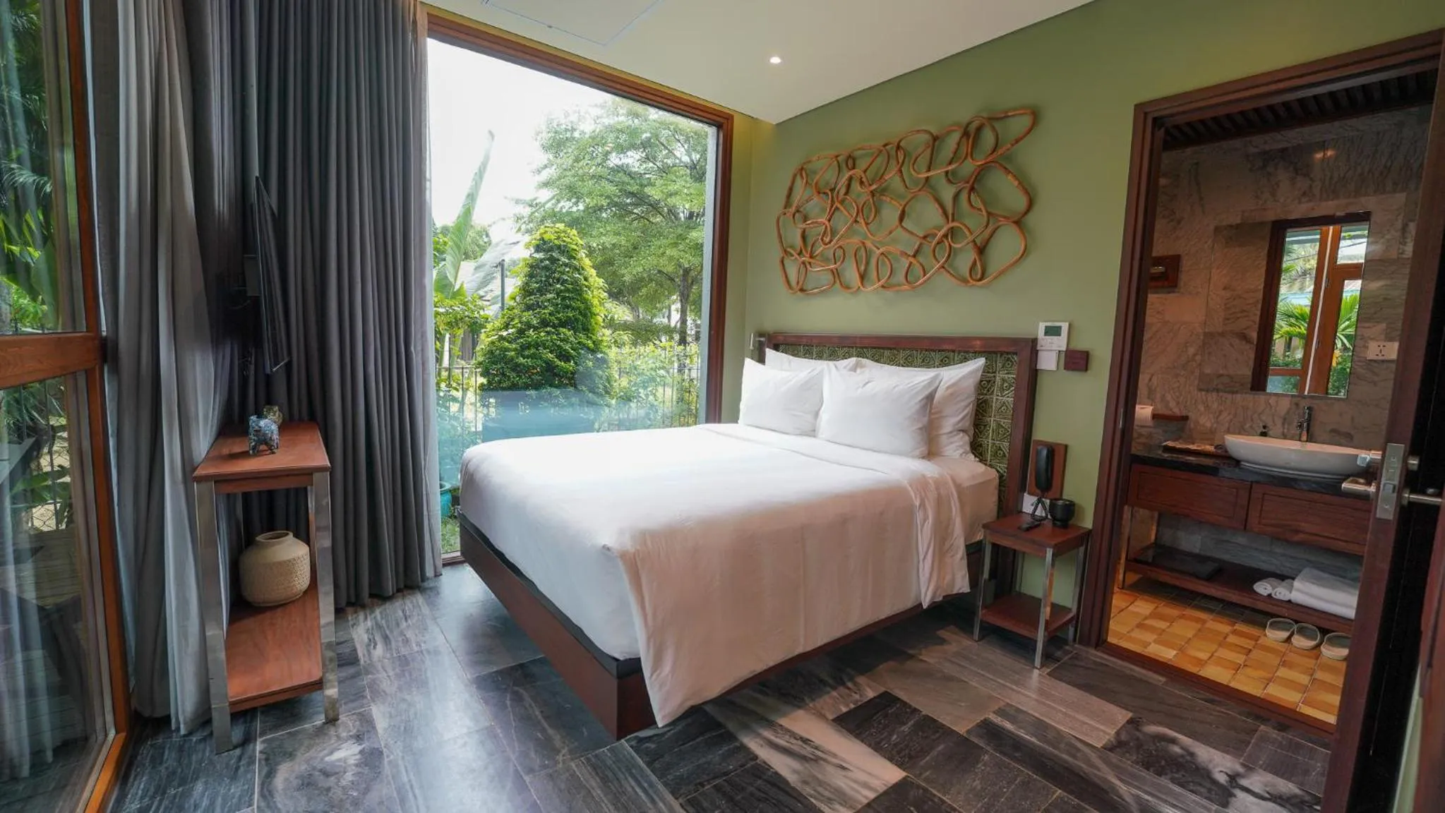 Photo of the whole room, Bed in CHiEM HoiAn - The Beachside Boutique Hotel & Villa