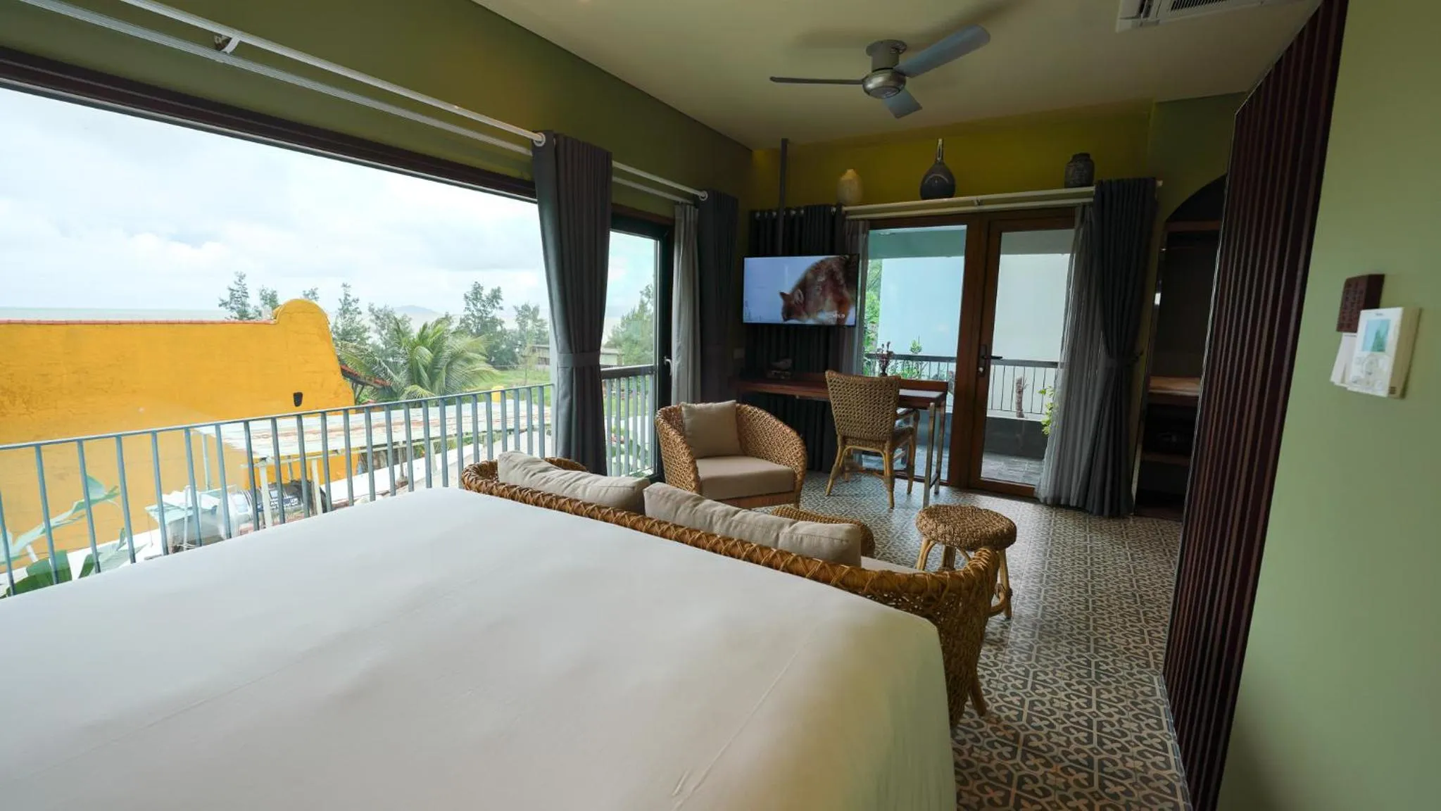 View (from property/room), Bed in CHiEM HoiAn - The Beachside Boutique Hotel & Villa
