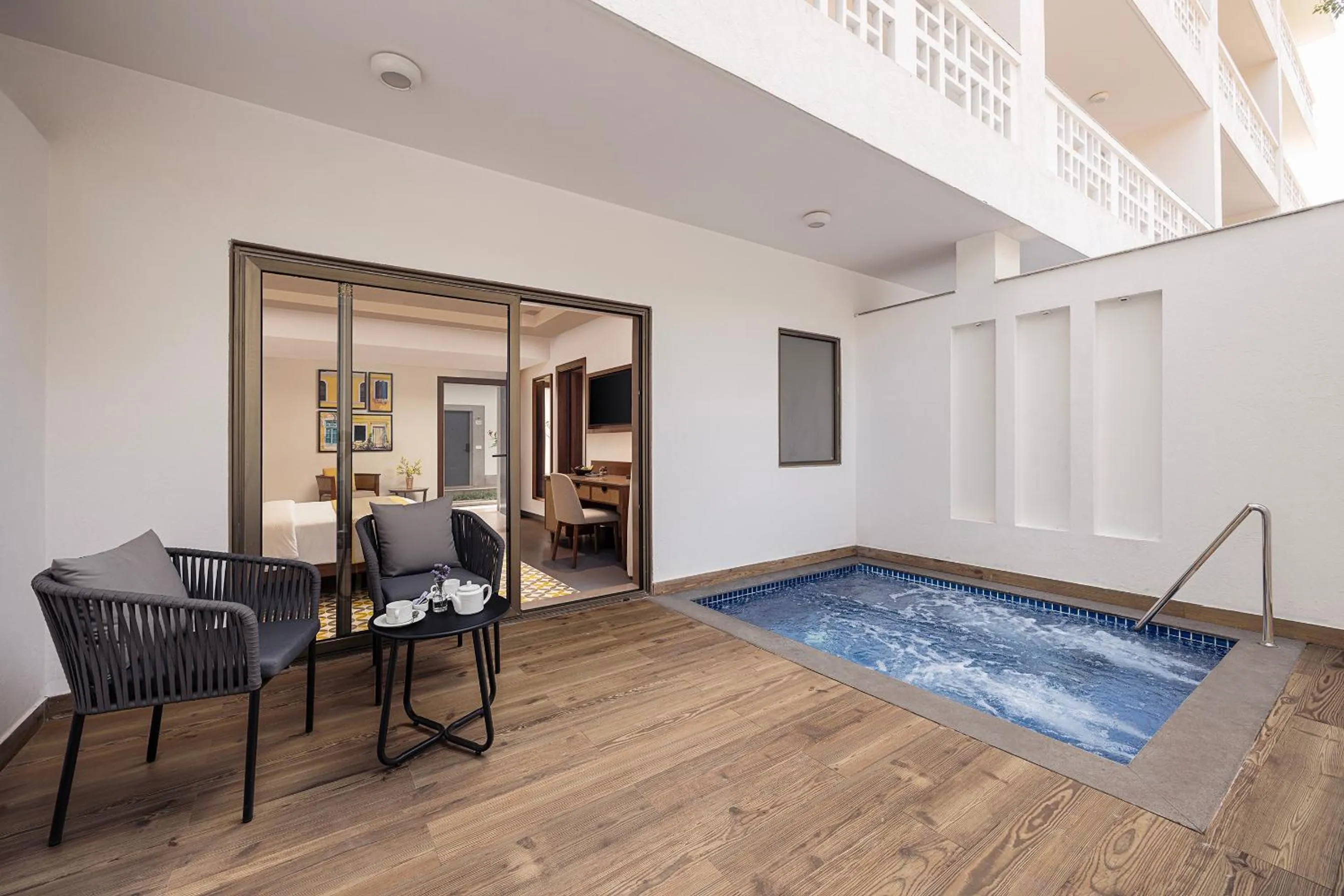 Swimming pool in The Yellow House, Goa - IHCL SeleQtions