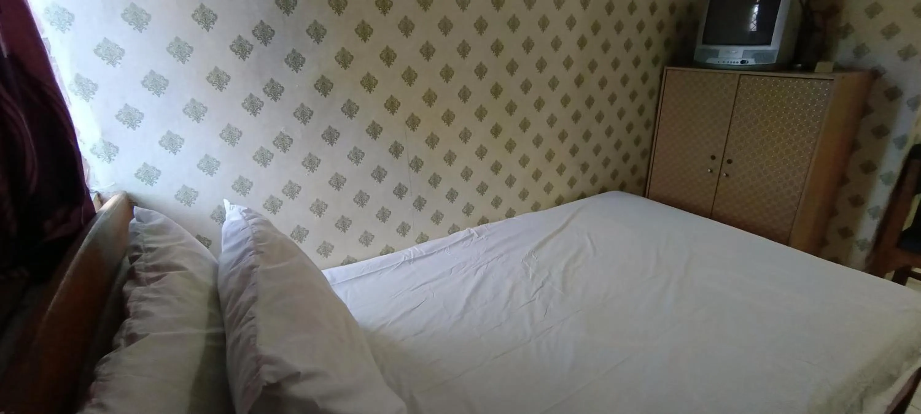 Bedroom in SPOT ON 92338 Karin Kost