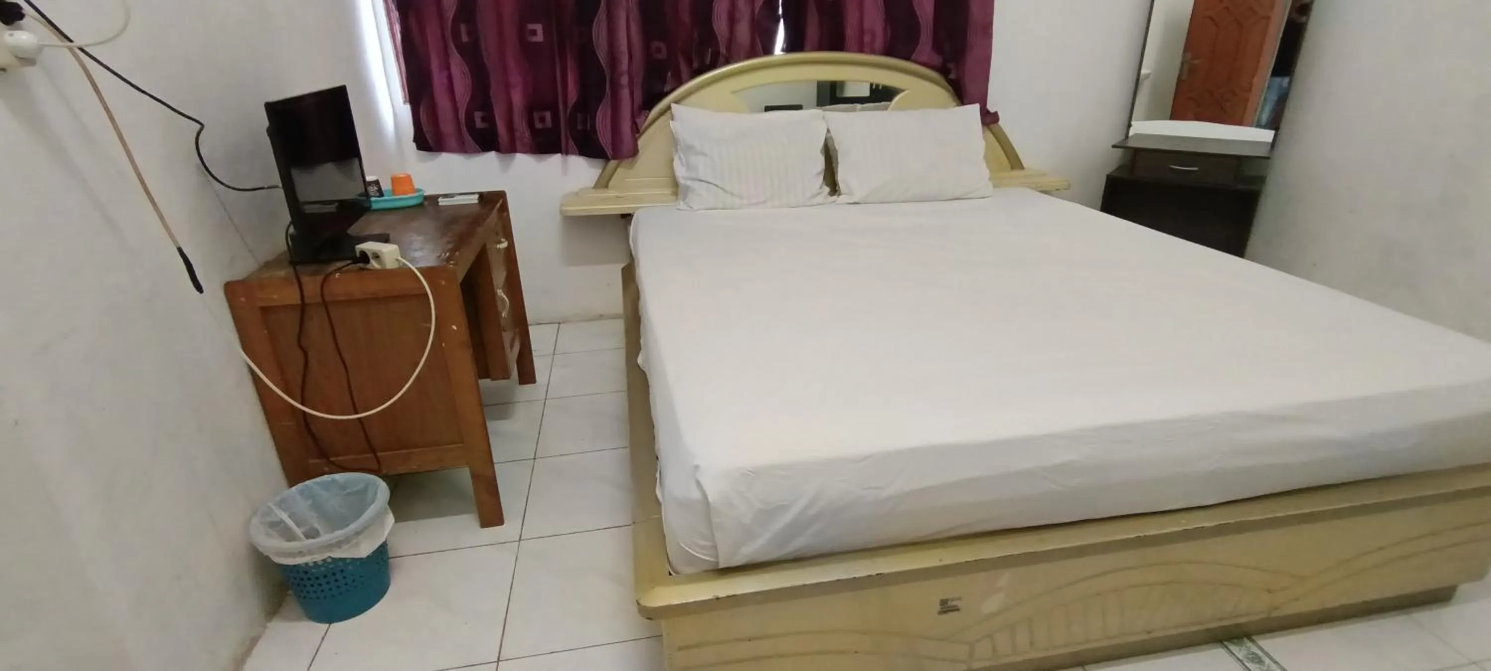 Bedroom in SPOT ON 92338 Karin Kost