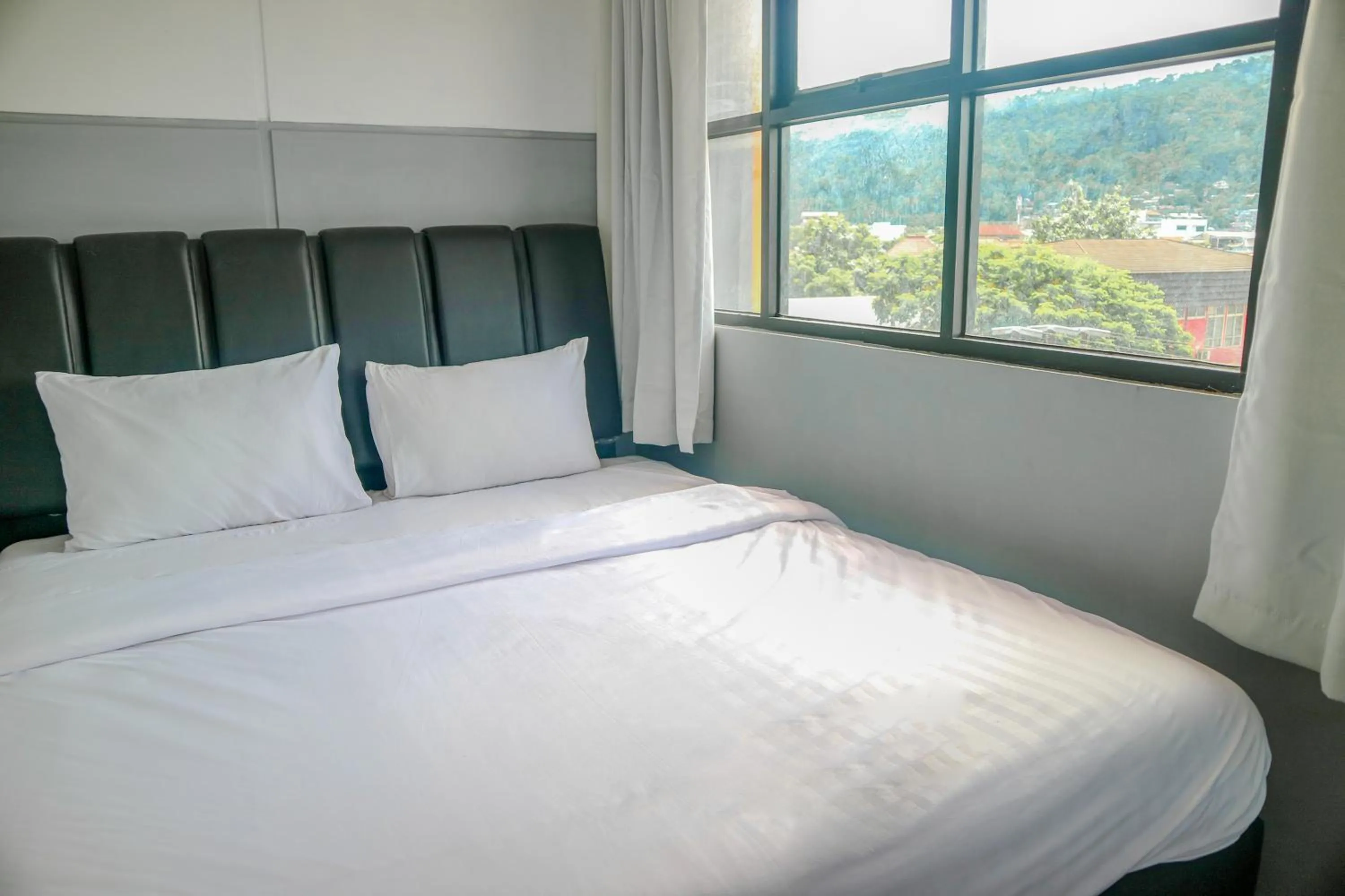 Bed in 360 Homestay Padang