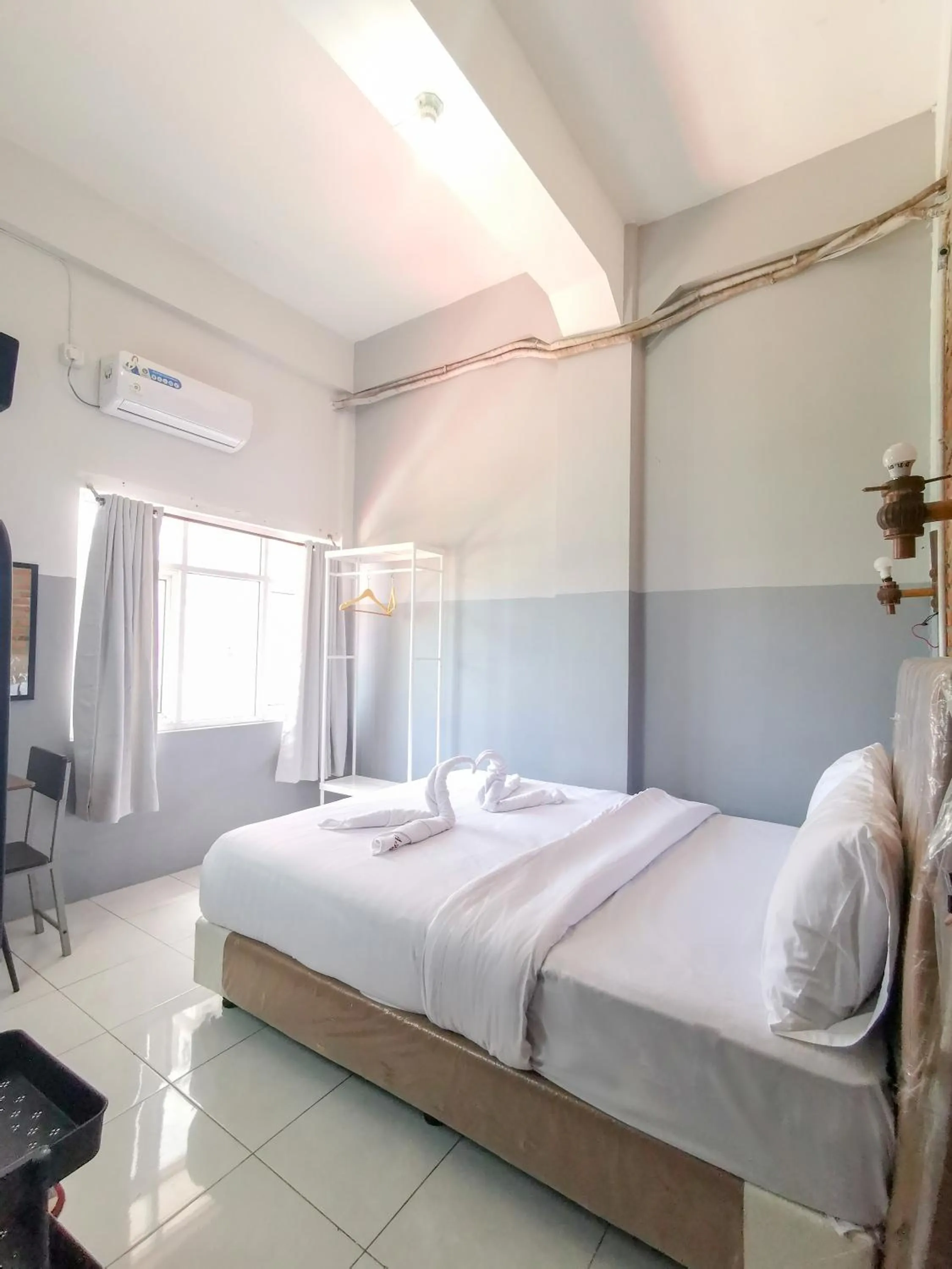 Bed in 360 Homestay Padang